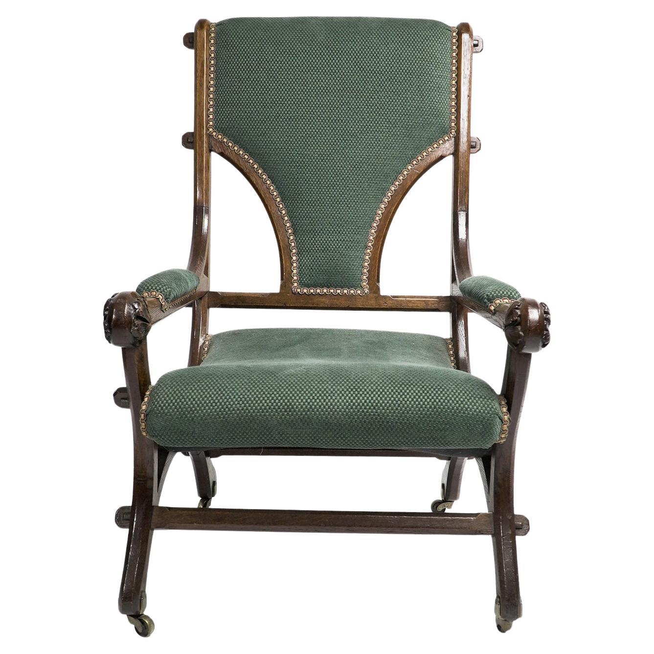 John Pollard Seddon attributed. A Gothic Revival oak armchair with through pegged tenon joints that have faceted edges to the ends of the tenon, a typical detail Seddon used often. The overall style and design has a good flow to it with soft