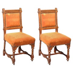 John Pollard Seddon A pair of Gothic Revival oak dining chairs. 4 more available