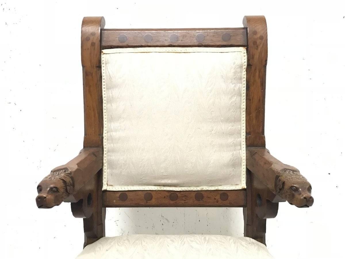 Hand-Carved John Pollard Seddon A Rare Gothic Oak Armchair with Carved Dog Heads to the Arms For Sale