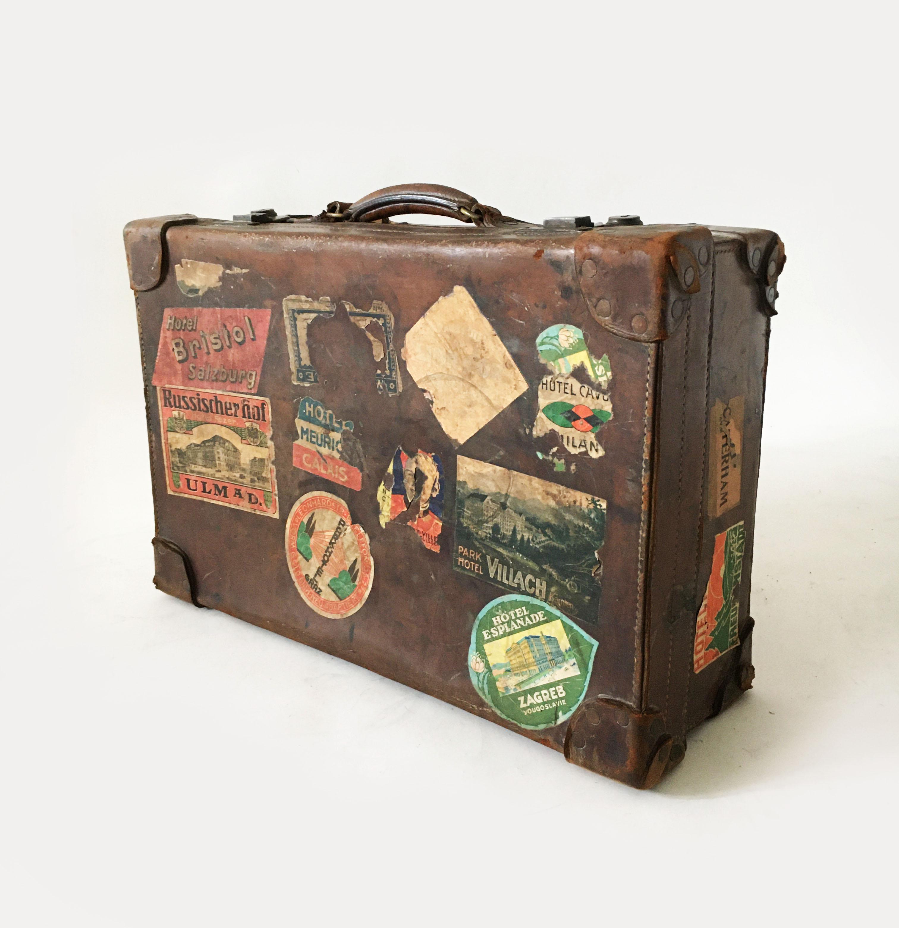 John Pound London leather luggage, England, 1920s. John Pound is the oldest luggage brand in the world. Starting life in the City of London in 1823 making trunks and luggage for the gentry from its base in Leadenhall Street, the brand pre-dates all