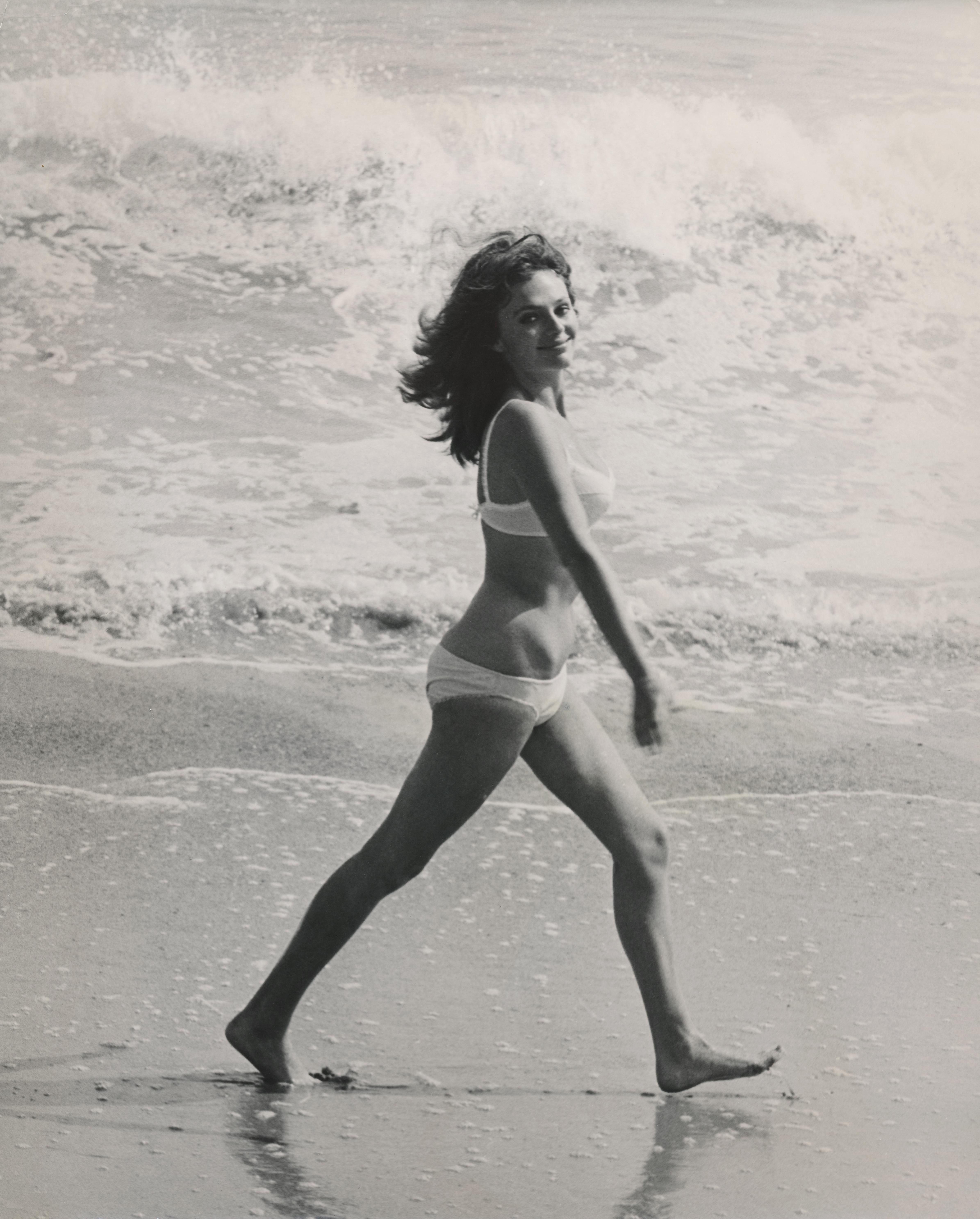 John R. Hamilton Portrait Photograph - Jacqueline Bisset Walking on the Beach Fine Art Print