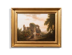 Rinder in einer Landschaft, dahinter die Ruinen der alten Burg