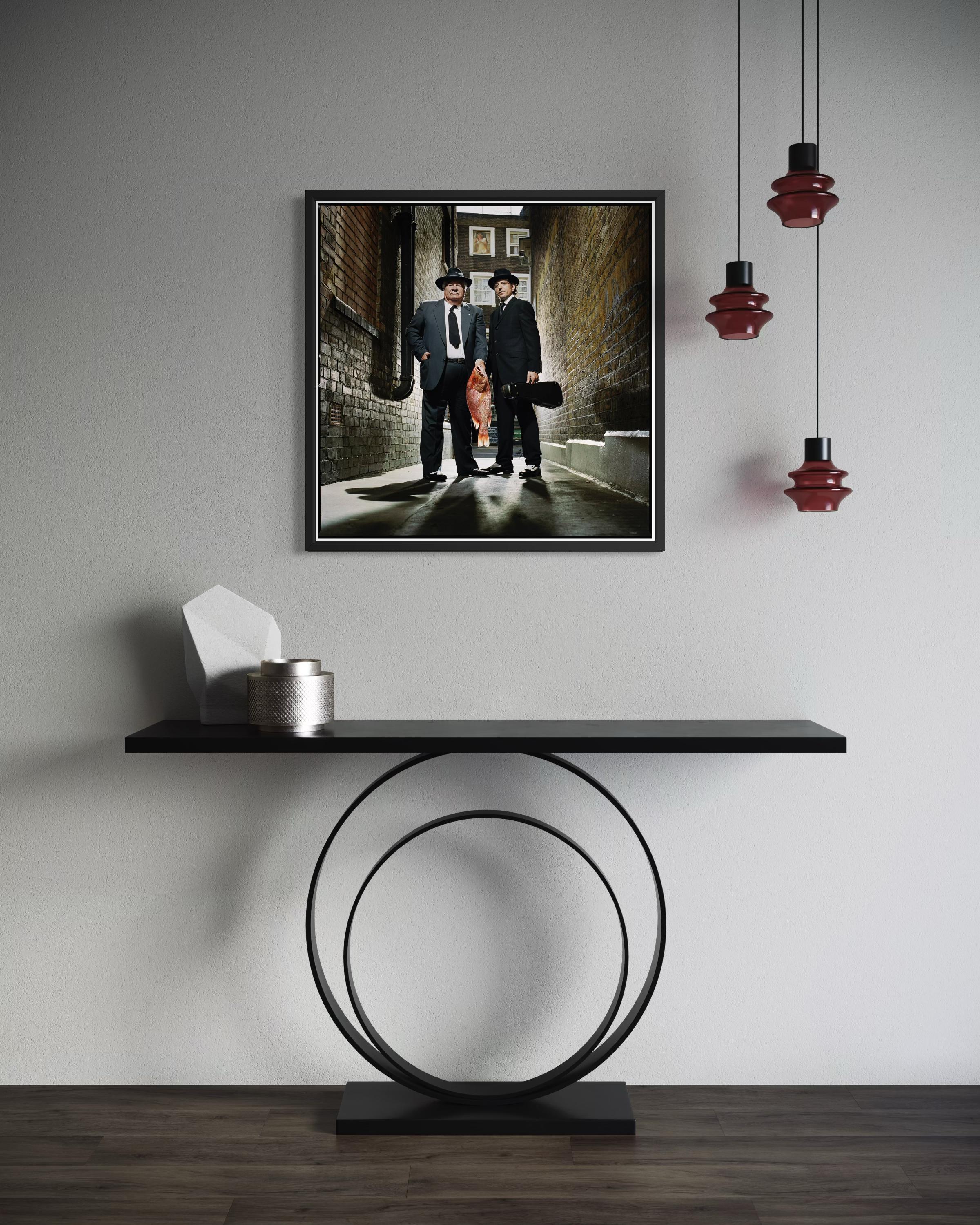 Chefs: Carluccio and Locatelli with Fish and Violin, England, Large Photograph en vente 4