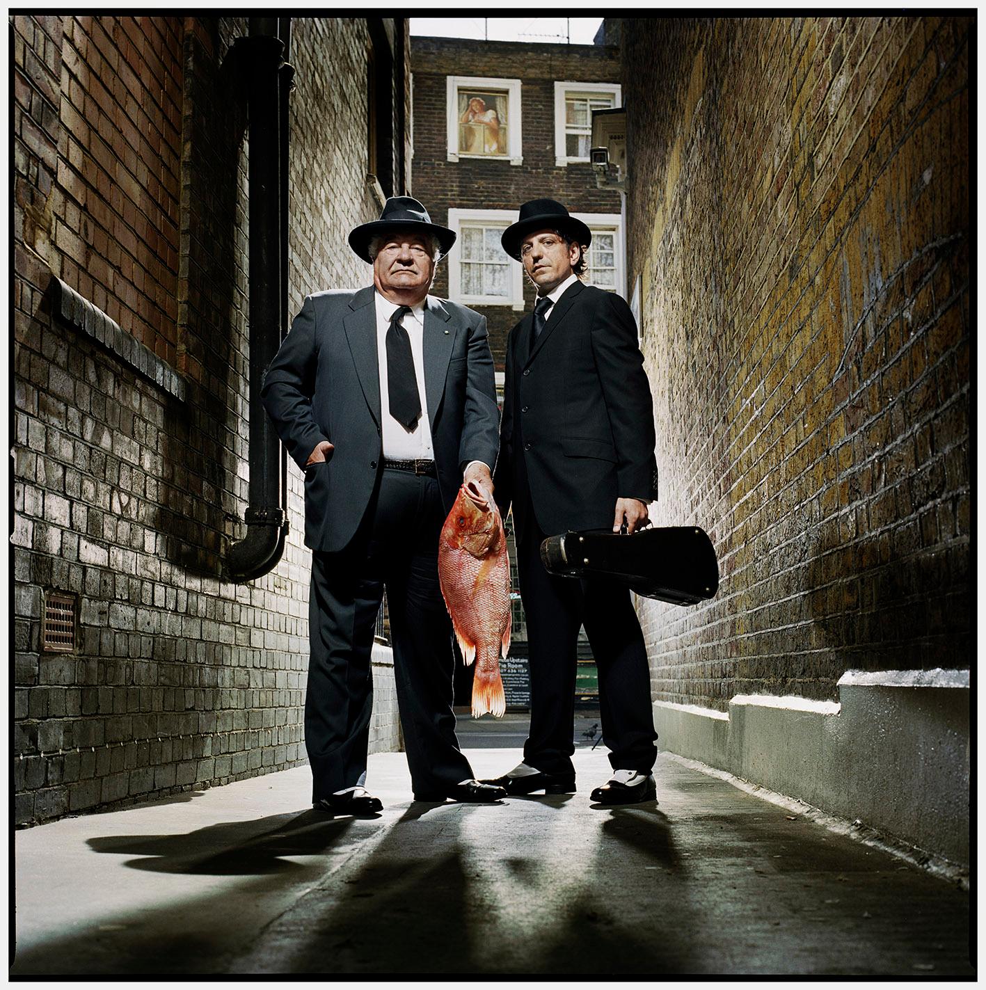 Chefs: Carluccio and Locatelli with Fish and Violin, England, Large Photograph