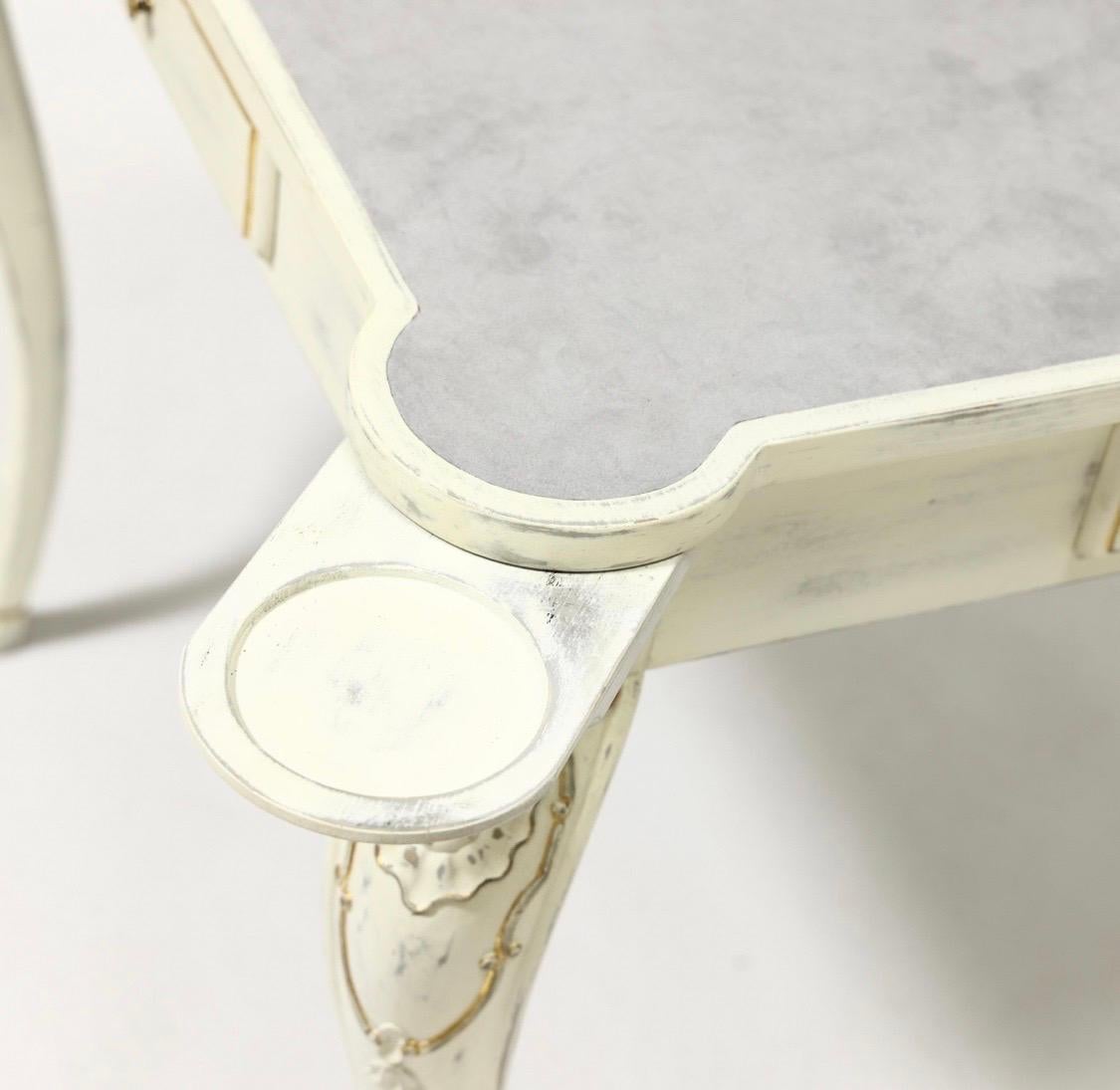 Beautiful John Richard Game Table with cabriole legs. Antique brass finished pulls, four drink holders, and a gray suede top make this table so special. 