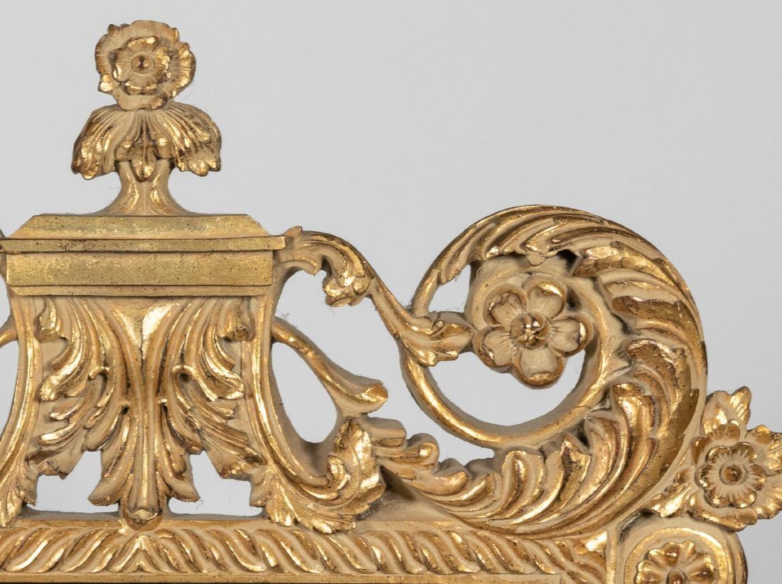 John Richard giltwood carved Louis XVI style beveled wall or console mirror.
