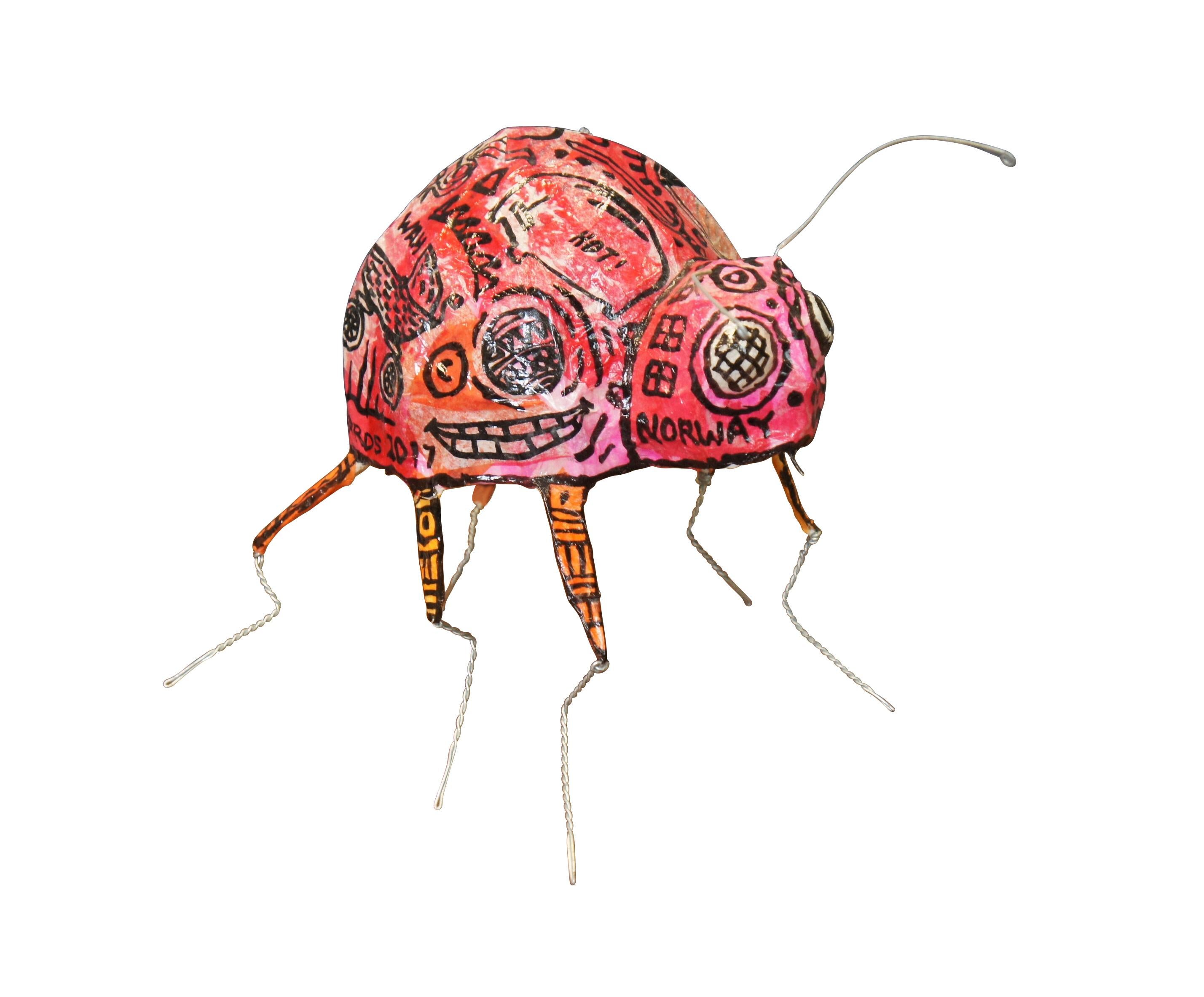 Rare vintage mixed media art nightlight in the shape of a pink and orange round backed bug covered in graffiti, crafted by John Richards of the Yummy Mud Puddle Gallery, Burnsville, North Carolina. Vinylized paper on wire frame. Signed and dated