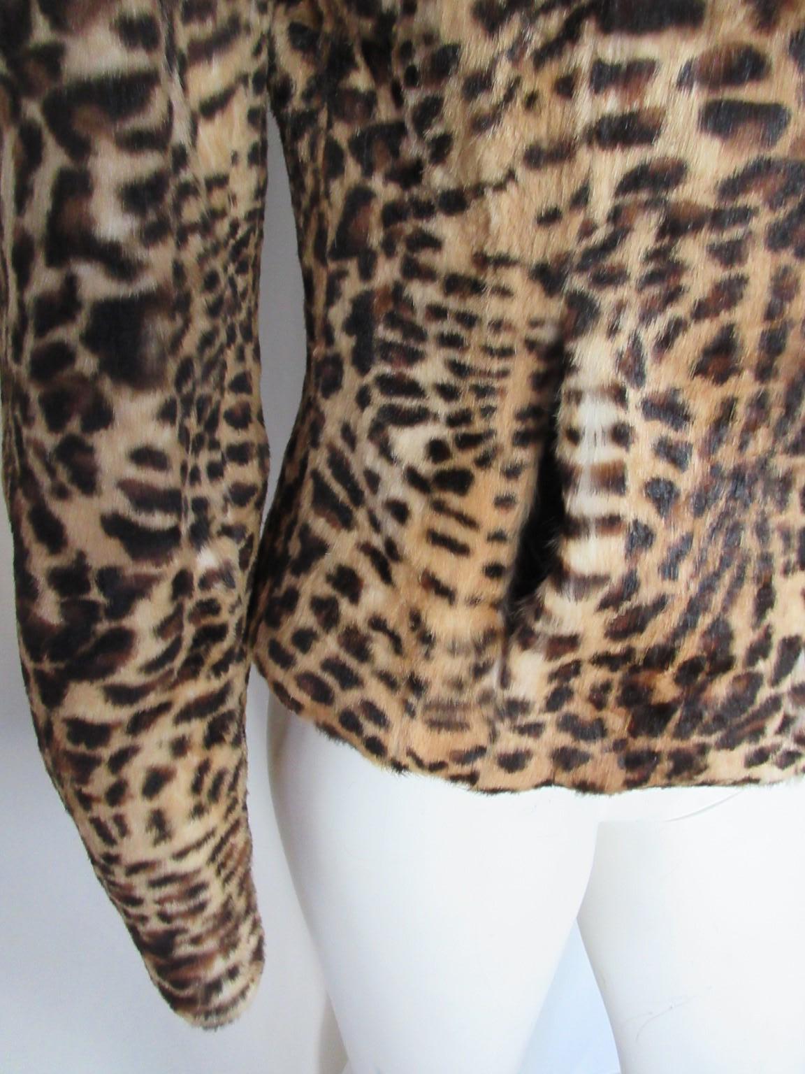 Printed Leopard Lapin vintage fur jacket from John Richmond

We offer more exclusive fur & vintage couture items, view our front store

Details:
2 pockets, 3 closing hooks,
fully lined
white leather panels at the back of sleeves
Soft fur and very