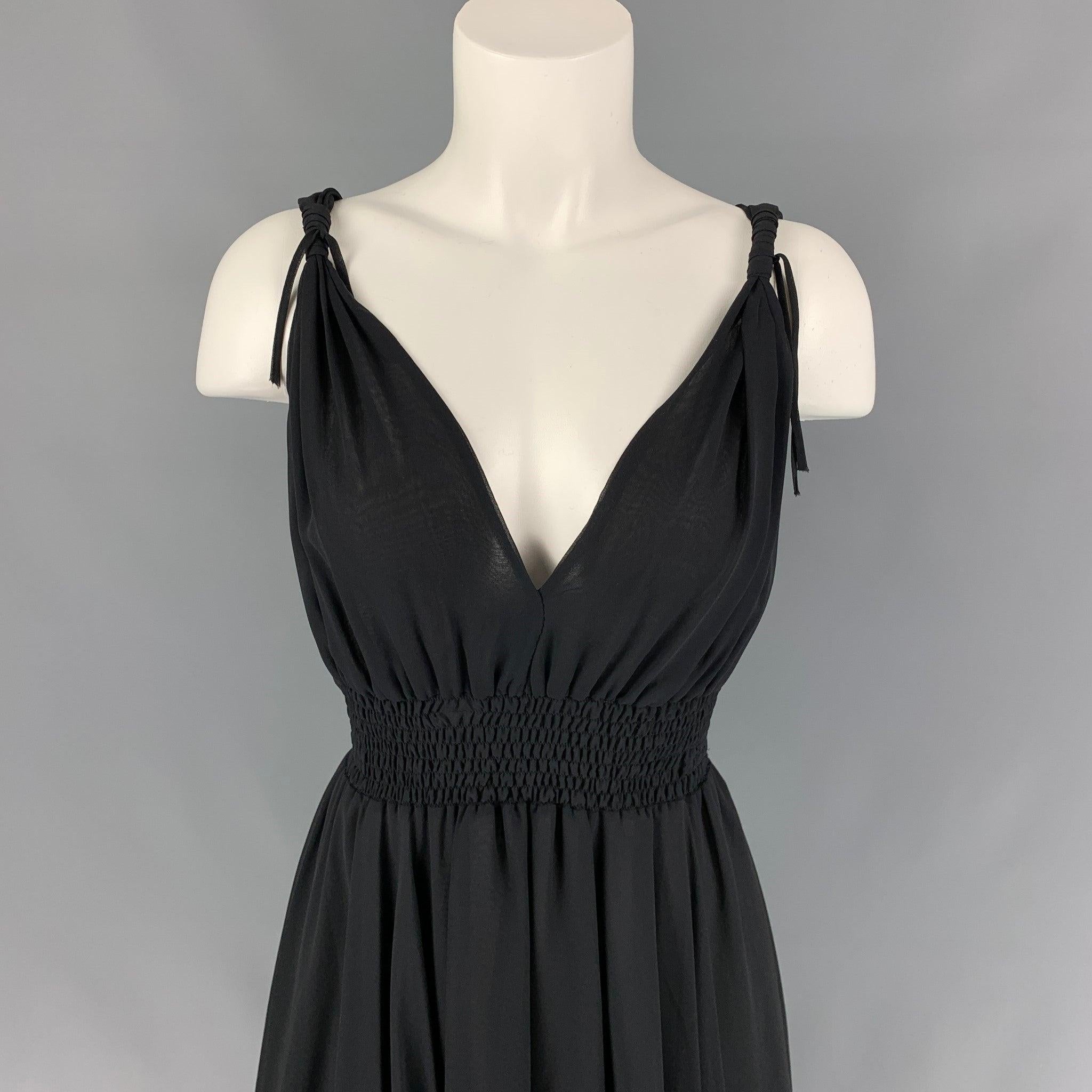 JOHN RICHMOND dress comes in a black chiffon material featuring an a-line style, elastic waist, and knotted strap details.
Very Good
Pre-Owned Condition. Fabric tag removed. 

Marked:   Size tag removed.  

Measurements: 
  Bust: 28 inches  Waist: