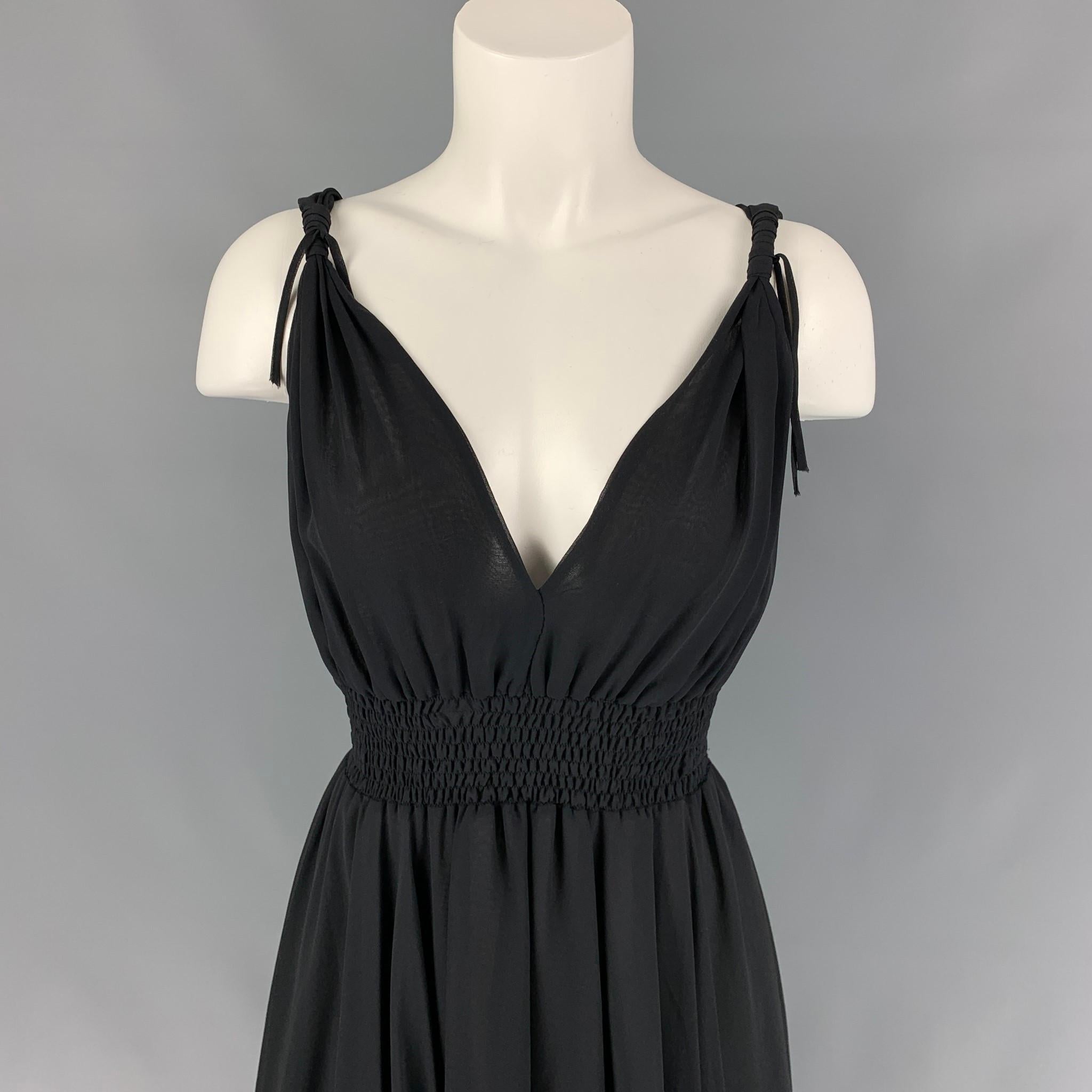 JOHN RICHMOND dress comes in a black chiffon material featuring an a-line style, elastic waist, and knotted strap details. 

Very Good Pre-Owned Condition. Fabric tag removed.
Marked: Size tag removed.

Measurements:

Bust: 28 in.
Waist: 22 in.
Hip: