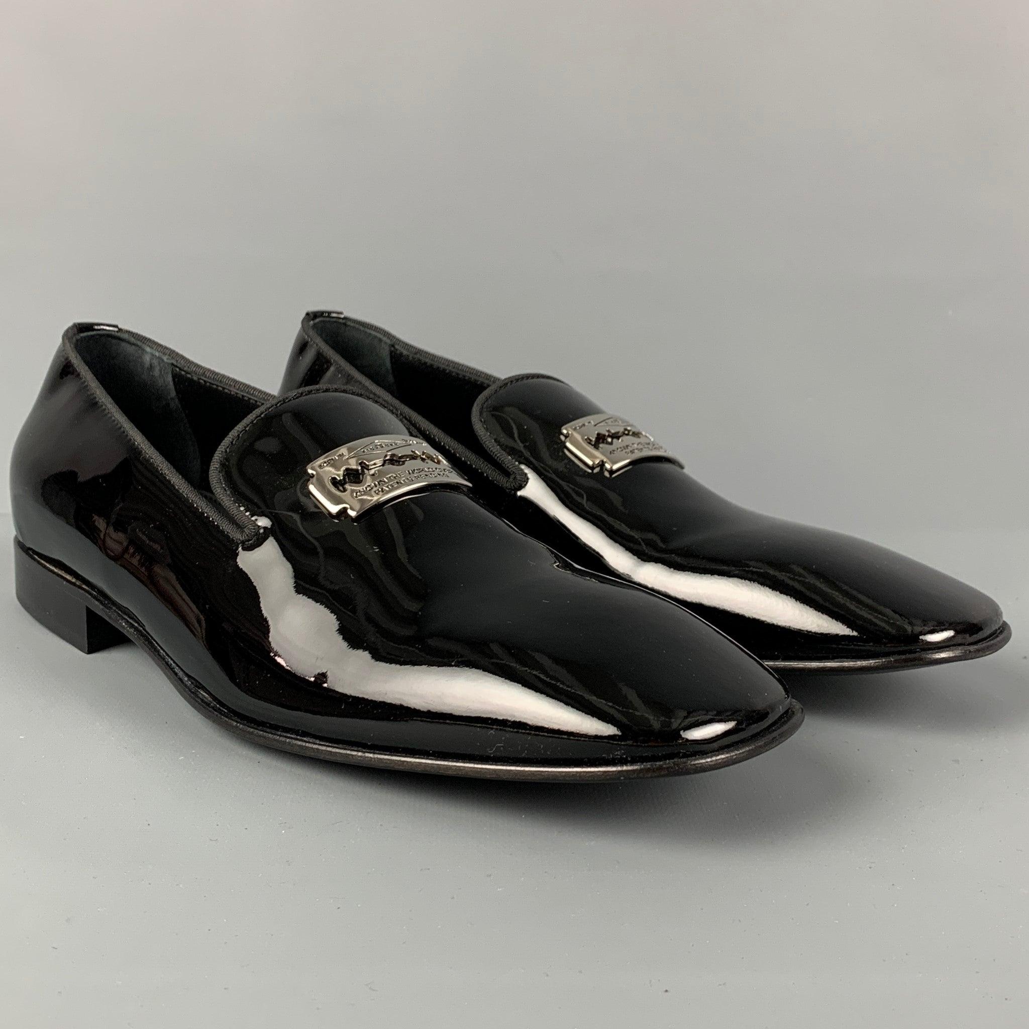 JOHN RICHMOND loafers comes in a black patent leather featuring a silver tone razor blade detail, slip on, square toe, and includes a match belt. Made in Italy. Very Good
Pre-Owned Condition. 

Marked:   42.5Outsole: 12 inches  x 4 inches 
-BeltVery
