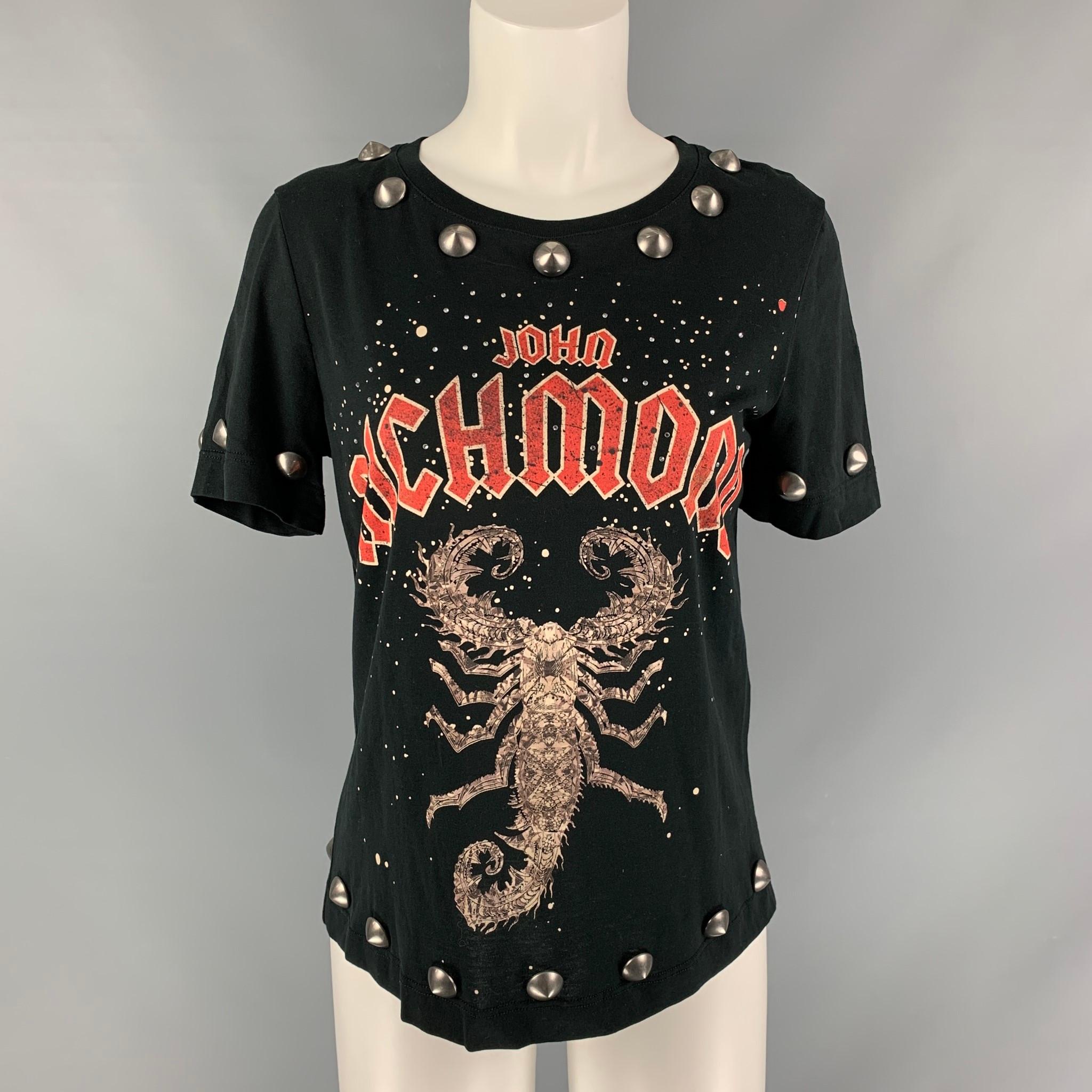 JOHN RICHMOND T-shirt comes in a black cotton jersey featuring a crew neck, graphic print at center front and studded details. Made in Italy.

Excellent  Pre-Owned Condition.
Marked: Small

Measurements:

Shoulder: 16 in.
Bust: 40 in.
Sleeve: 8.5