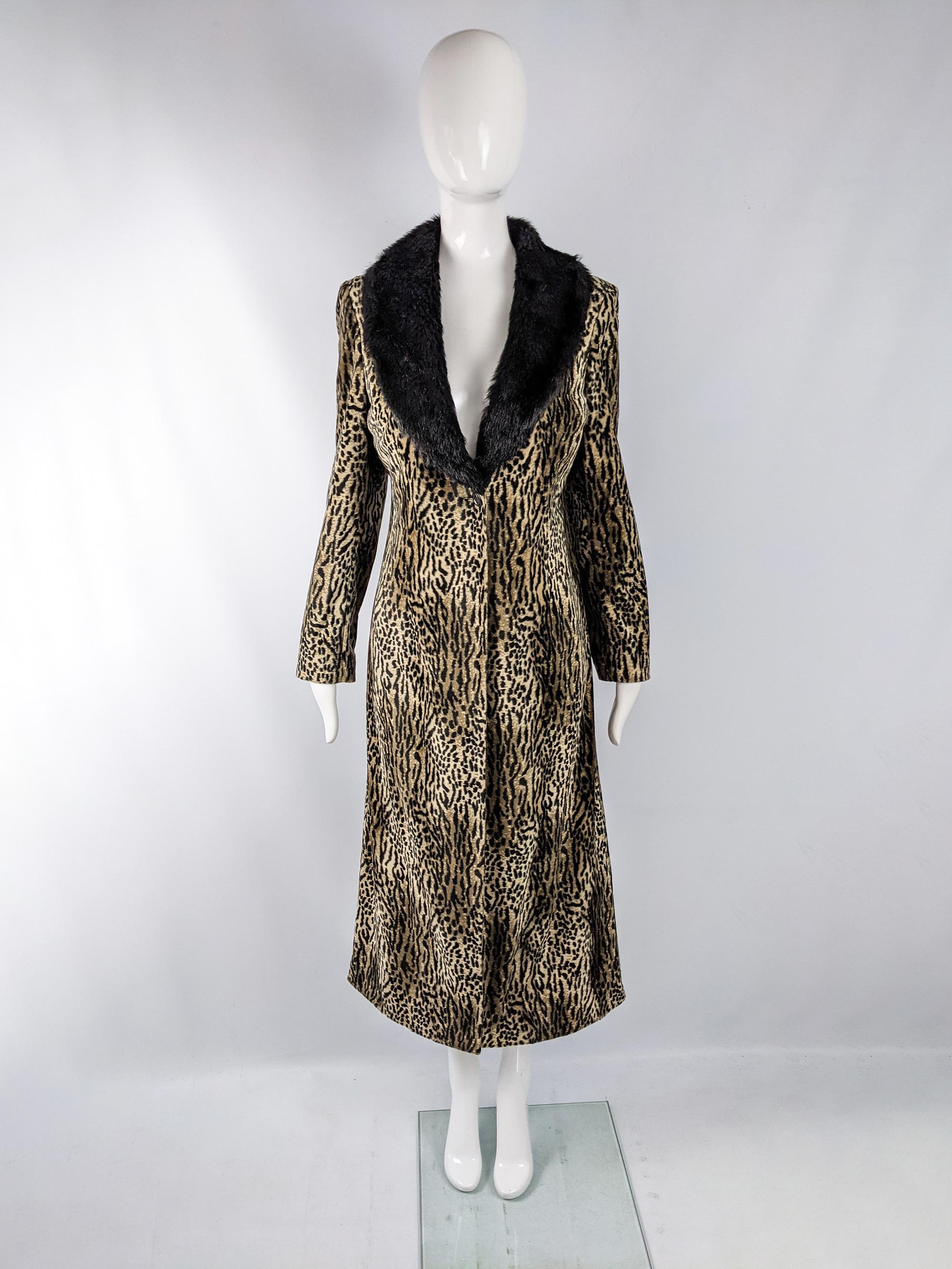 A fabulous vintage John Richmond maxi coat from the early 2000s. In an animal printed short pile faux fur fabric with a huge, glamorous black faux fur collar. 

Size: Marked IT 40 which roughly equates to a UK 8/ US 4/ EU 36 but this gives a