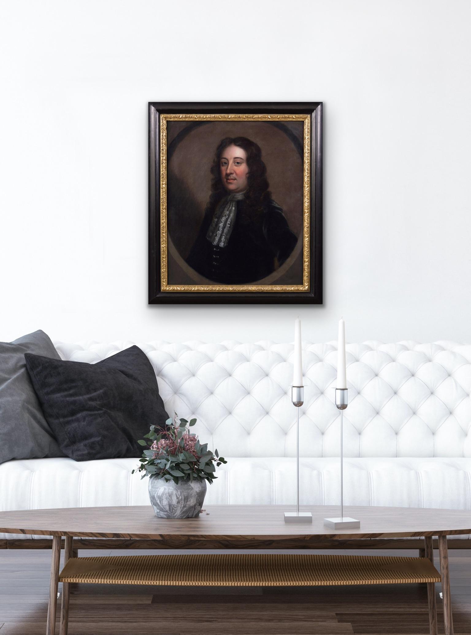 Circle of John Riley
British, (1646-1691)
Portrait of a Gentleman
Oil on canvas
Image size: 29 inches x 24 inches 
Size including frame: 36 inches x 31 inches

A fine half-length portrait of a gentleman set in a feigned stone oval, C1690, circle of