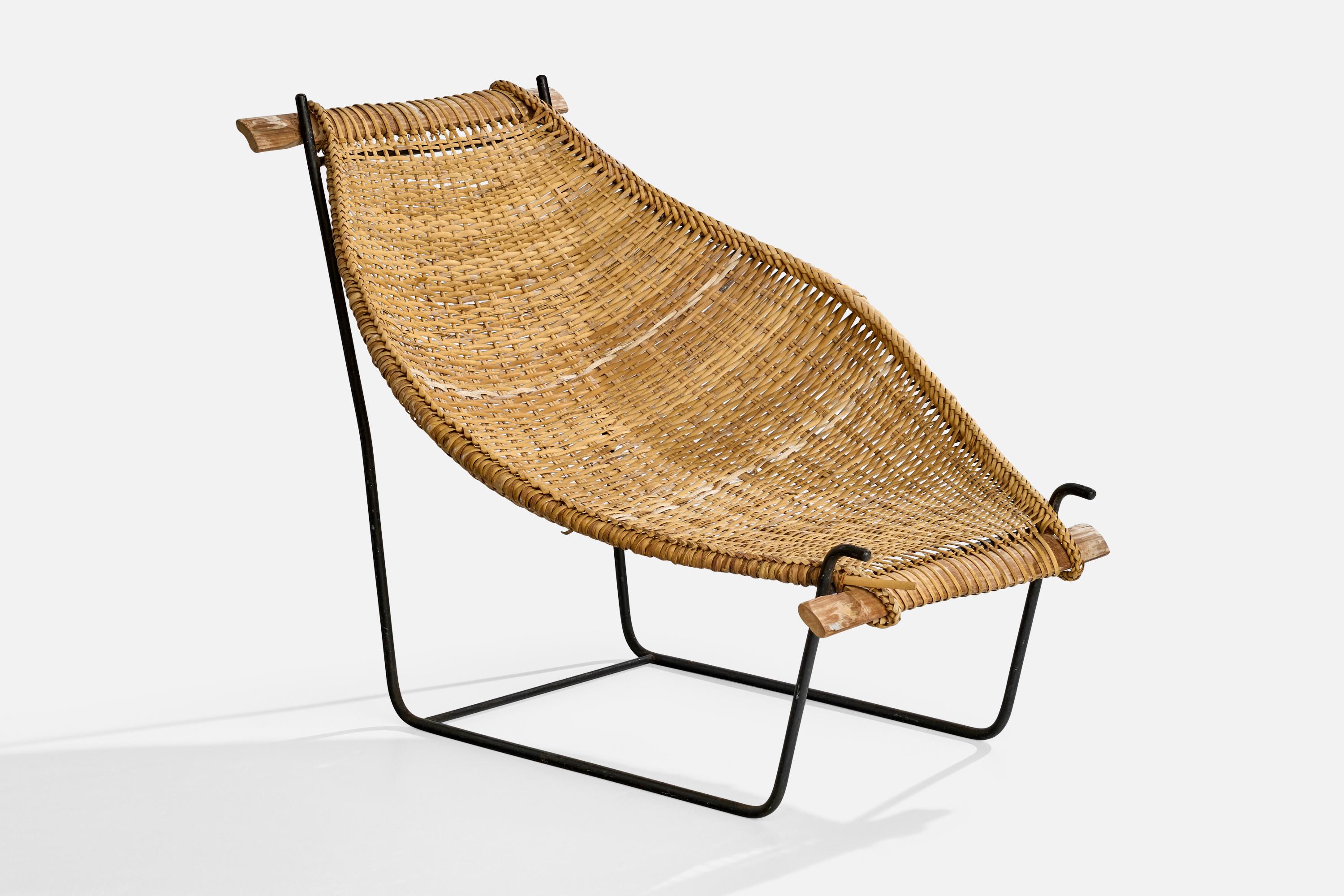 An iron, rattan and wood lounge chair designed by John Risley, USA, c. 1950s.

Dimensions: 33.4” H x 33.75” W x 41” D

Seat Height: 12.75” 