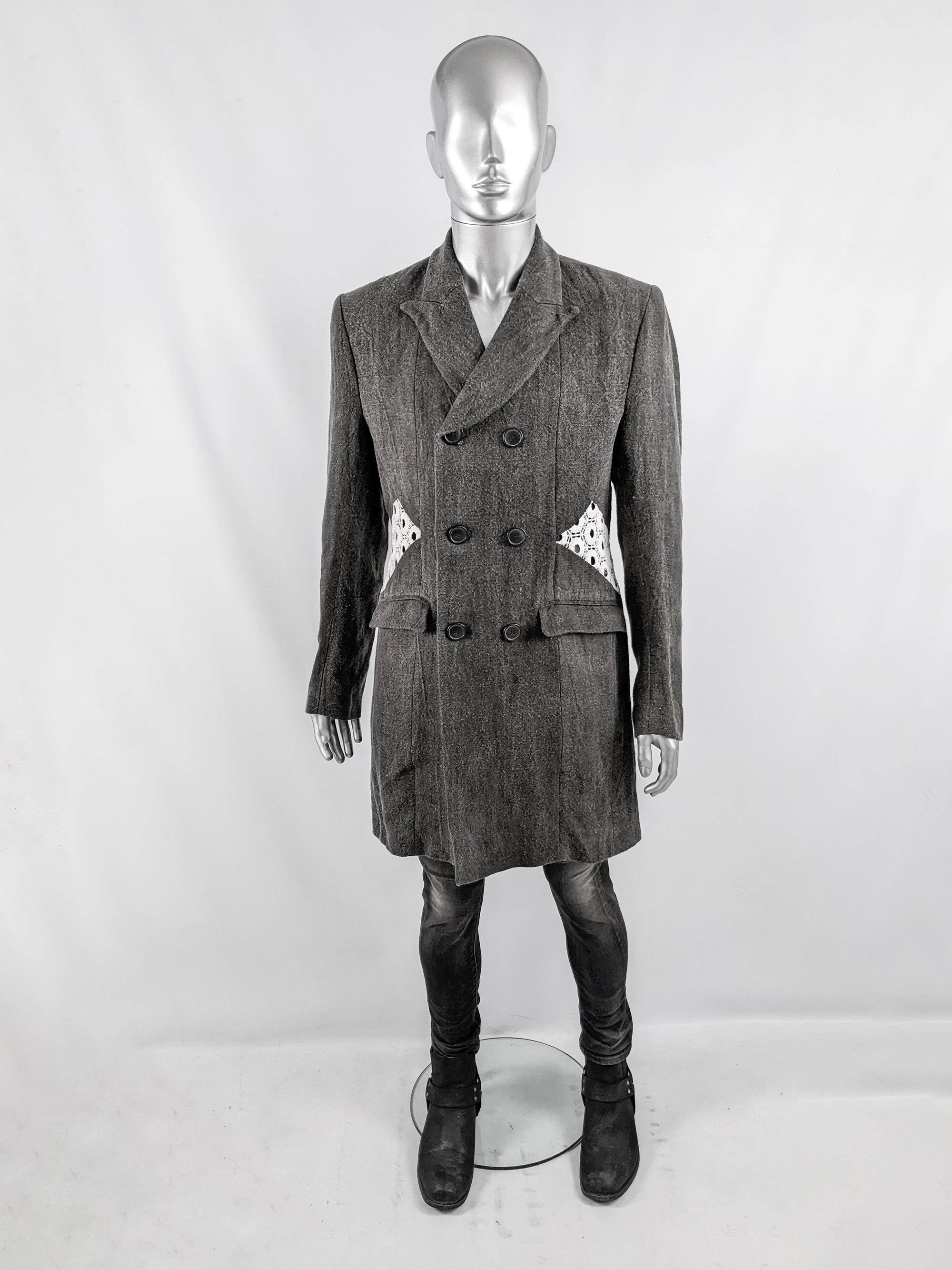 An incredible vintage mens coat from the early 2000s by luxury Hong Kong born fashion designer, John Rocha for his mainline (not to be confused with the inferior licenses like RJR John Rocha). In a grey linen fabric which gives incredible drape,