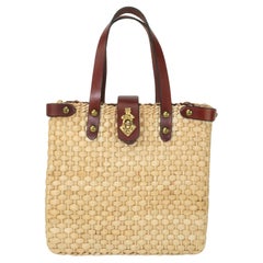 Bolso de mano John Romain de paja y cuero, años 60