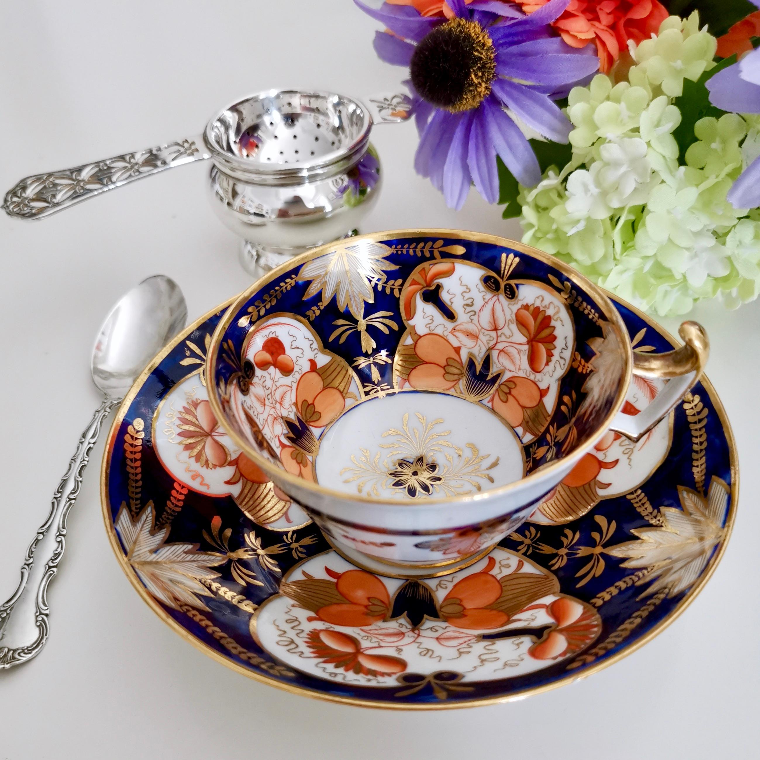 This is a beautiful teacup and saucer made by John Rose / Coalport in circa 1815, decorated in the Japanese Imari style with a striking cobalt blue, orange and gilt pattern.

Coalport was one of the leading potters in 19th and 20th century