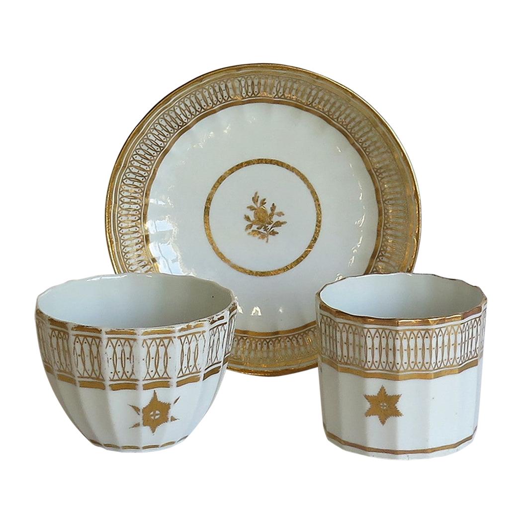 John Rose Coalport Trio Porcelain All Gilded Royal Garter Pattern, circa 1800