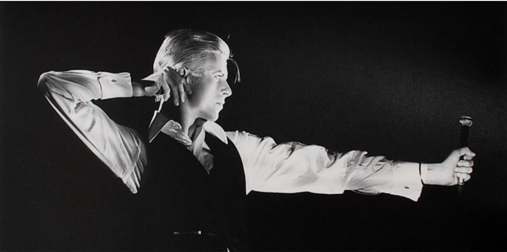 This iconic image of David Bowie as The Thin White Duke was taken by renowned Rock photographer, John Rowlands, on February 26th, 1976, at Maple Leaf Gardens in Toronto, Canada. Having seen the previous evening’s show on the 1976 Station To Station