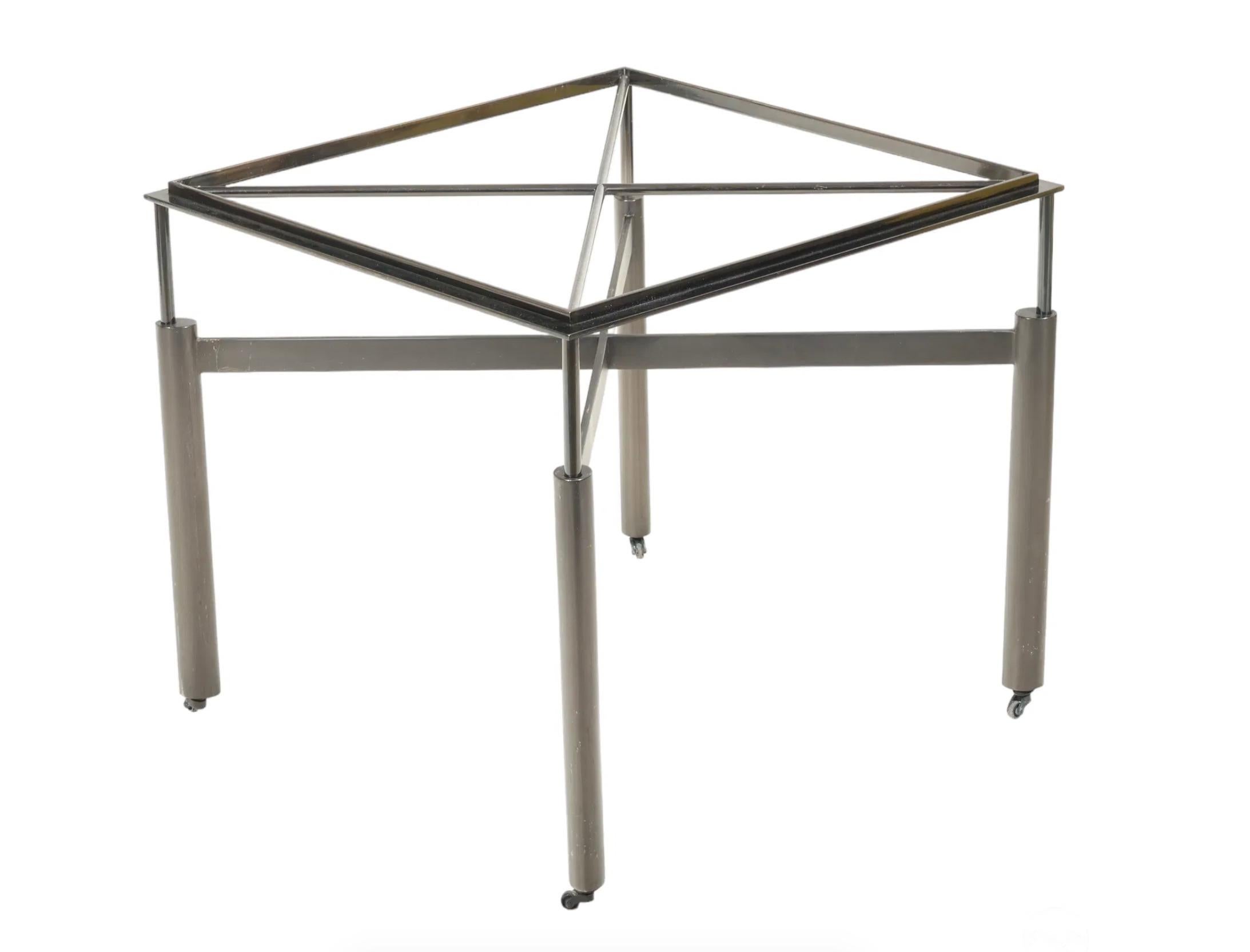 
Presenting a stunning designer accent, occasional, or coffee table created by the prestigious John Saladino Furniture of New York. This exquisite piece features a minimalist modern design, characterized by its slender rectangular split-level frame,