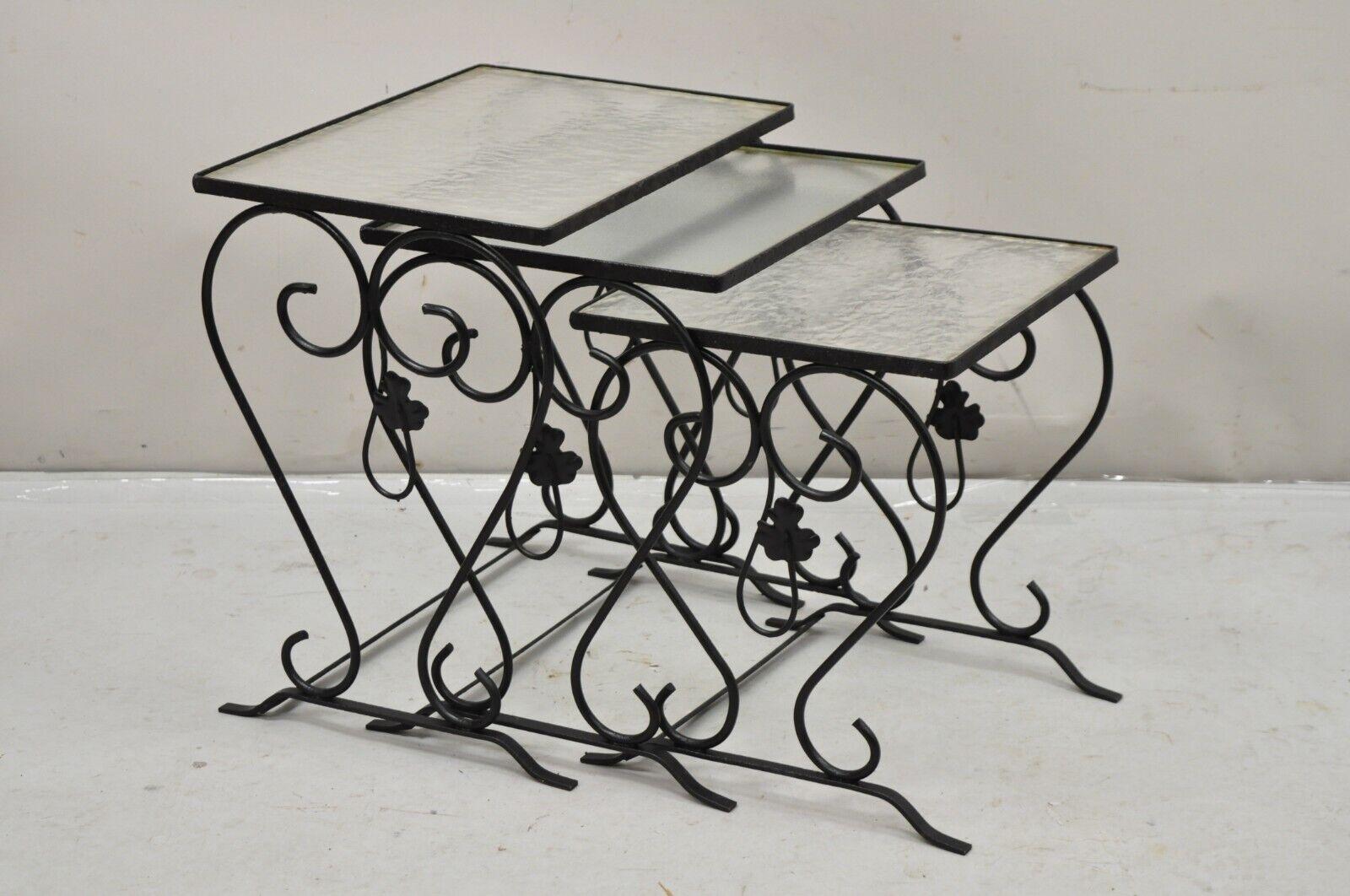 John Salterini Black Wrought Iron Maple Leaf Garden Nesting Tables - (Set of 3) with 2 pieces of textured plexiglass and one piece of textured real glass. Circa Mid 20th Century. Measurements: Largest Table: 18