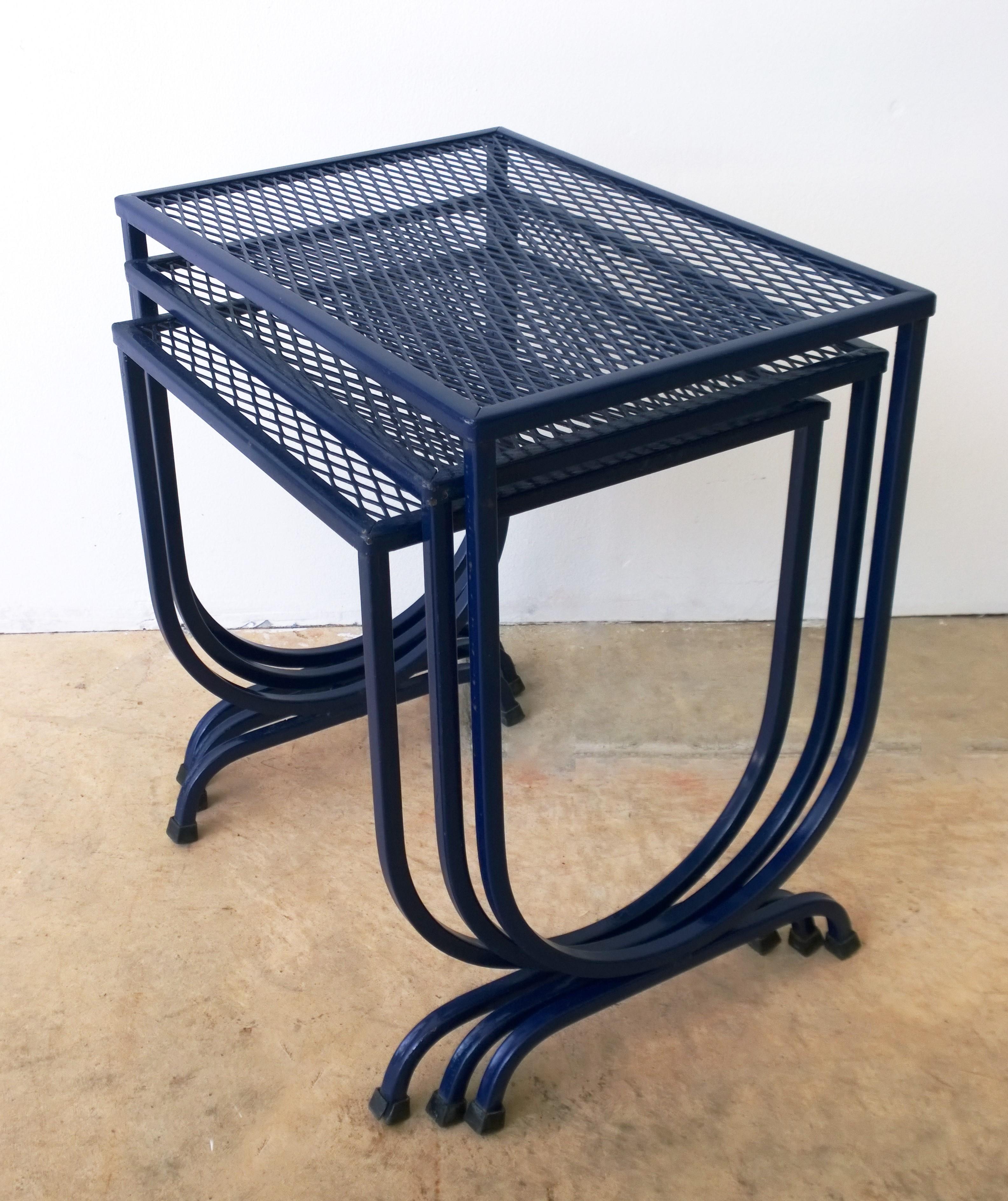Offered is Mid-Century Modern set of three John Salterini outdoor wrought iron patio / garden stacking / nesting tables newly enameled in navy blue. The stacking tables are easy to move around; however, they are quite sturdy. Wonderful for outdoor