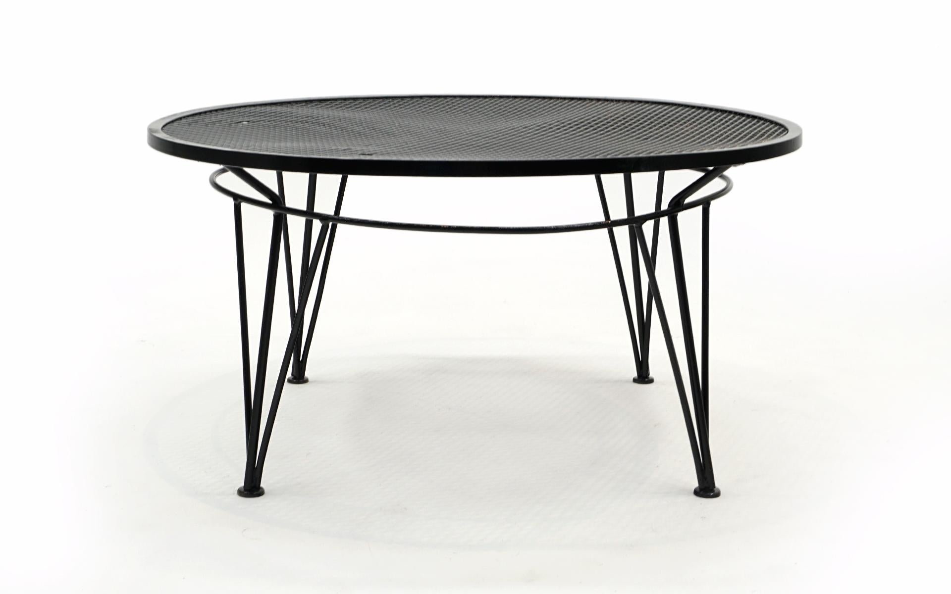 Round John Salterini outdoor / patio / pool / deck coffee table.  Professionally sand blasted and finished in a black gloss automotive paint.  More durable and long lasting than powder coating.  Some areas of slight unevenness to the top which is