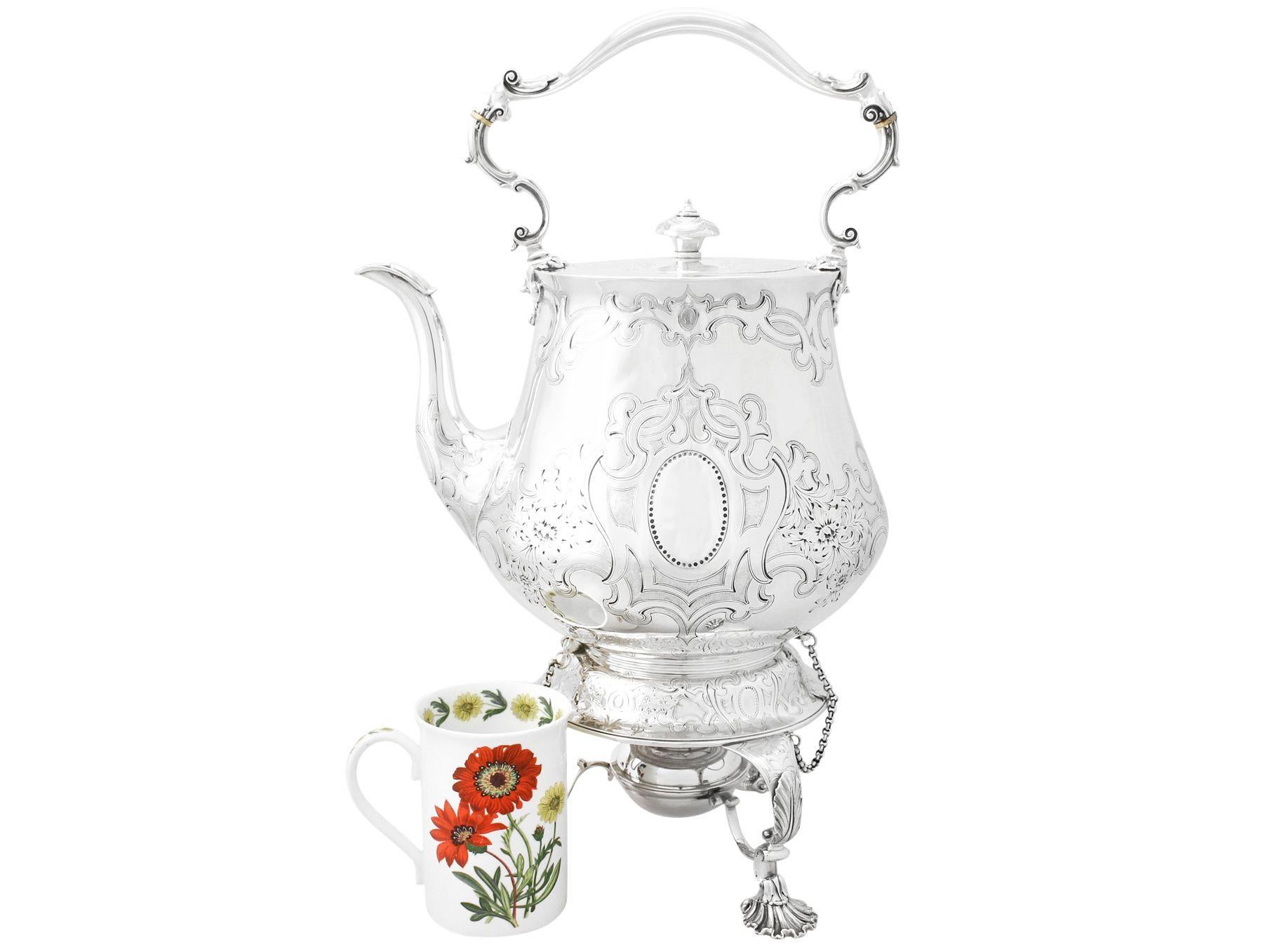 An exceptional, fine and impressive, large antique Victorian English sterling silver spirit kettle made by John Samuel Hunt; an addition to our antique silver teaware collection.

This antique Victorian sterling silver spirit kettle has a large