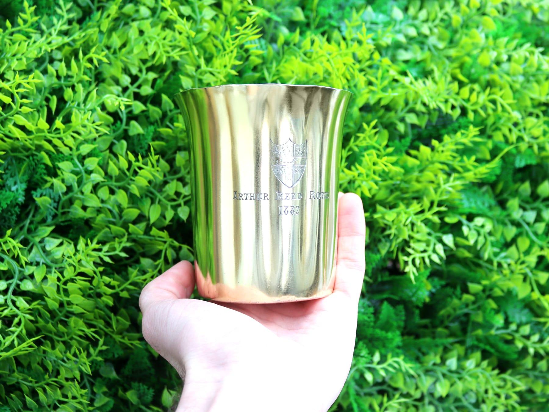 An exceptional, fine and impressive antique Victorian English sterling silver gilt beaker by John Samuel Hunt; an addition to our ornamental silverware collection.

This exceptional antique Victorian sterling silver gilt beaker has a cylindrical,