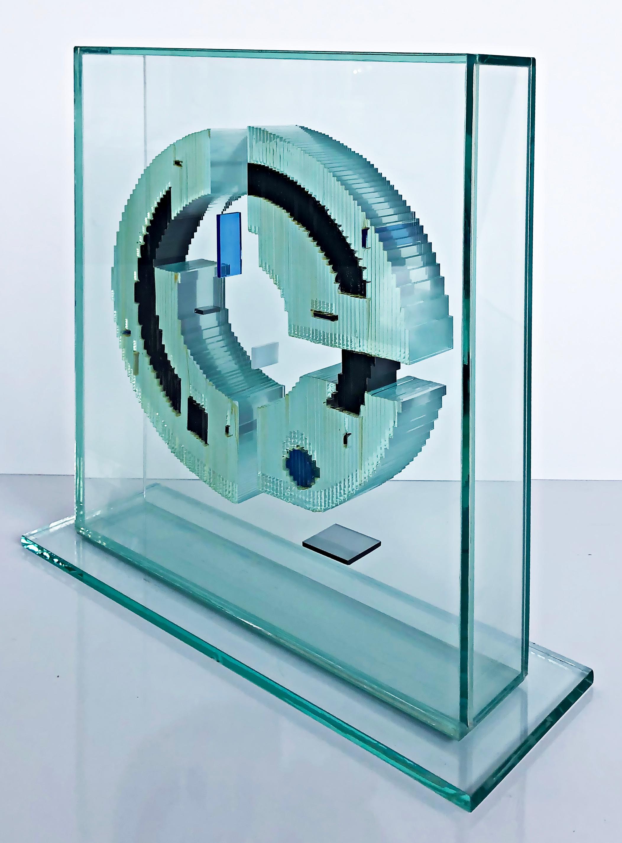 John Seitz abstract encased glass sculpture, signed and dated 1985

Offered for sale is an encased abstract glass sculpture by John Seitz. The piece is mounted on a glass base and is signed and dated 1985. John Seitz's studio is located in Ocala,