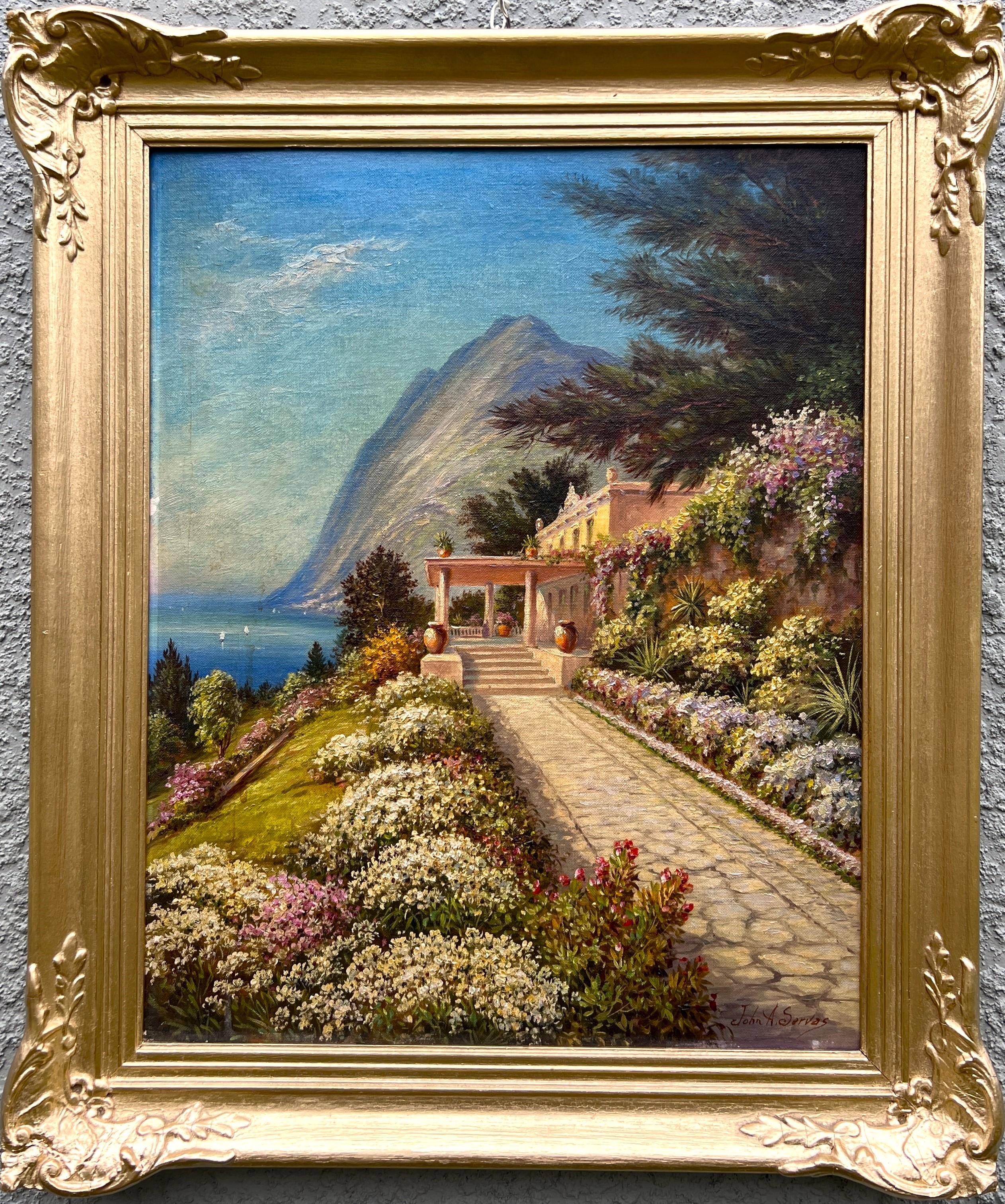This is an original oil painting on board depicting a vibrant Mediterranean garden landscape leading toward a picturesque seaside view. A stone pathway lined with lush greenery and blooming flowers guides the eye toward a classical villa terrace