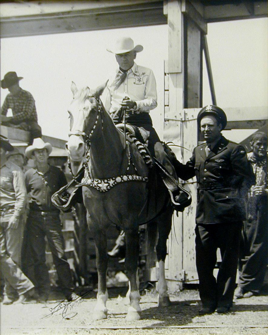 John Stryker Black and White Photograph - Mr. Everett Colborn of Dublin, Texas (mounted) and Flight Officer Gene Autry