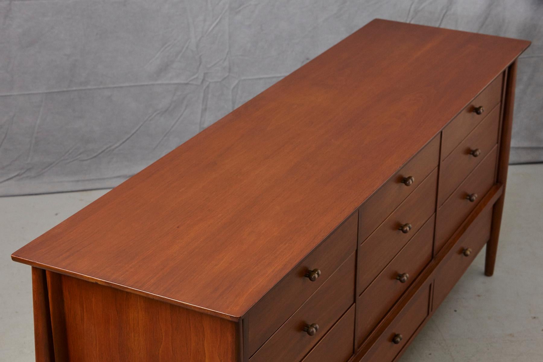 John Stuart 12 Drawers Walnut Credenza with Brass Pulls on Tapered Legs, 1960 4