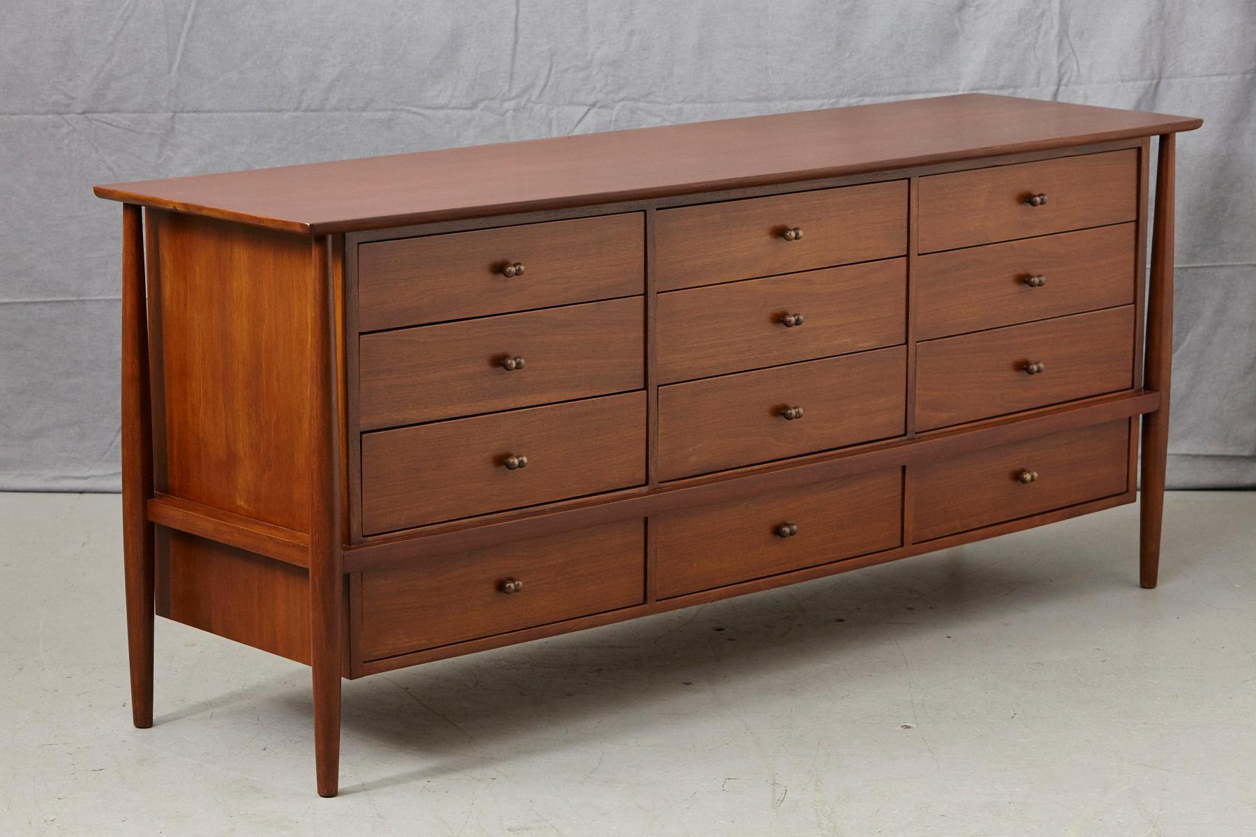 Mid-Century Modern John Stuart 12 Drawers Walnut Credenza with Brass Pulls on Tapered Legs, 1960