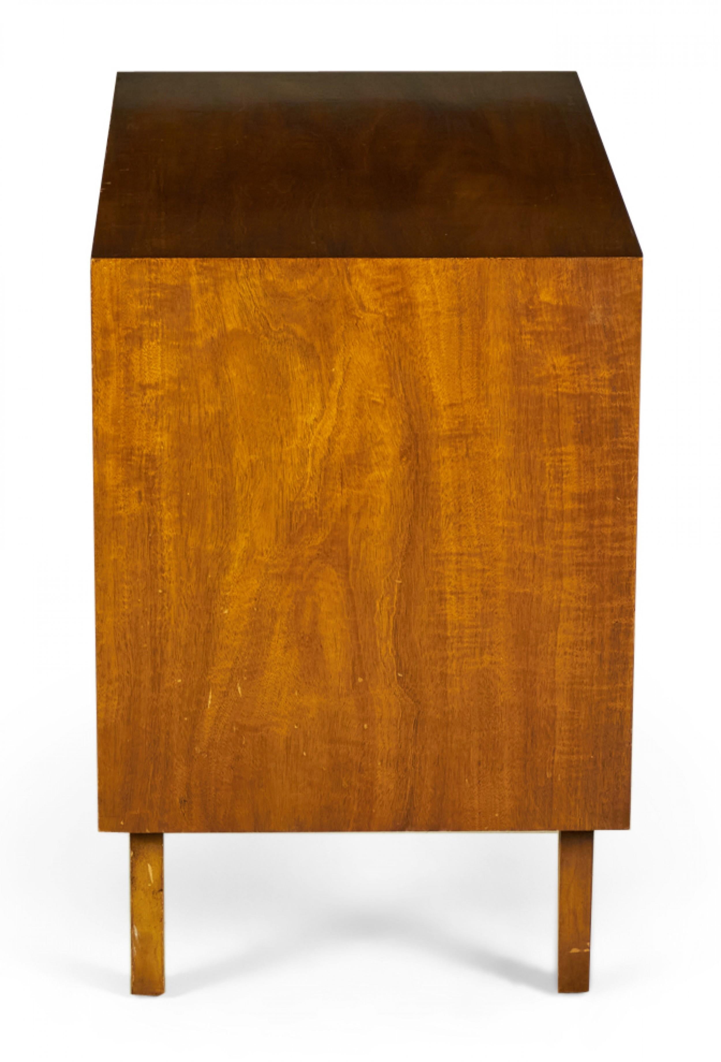 2 American mid-century walnut bedside tables / end tables with a single drawer to the right of an open compartment over a mirrored base arrangement comprised of an open cabinet and a larger closed cabinet that opens to the left with a slat front