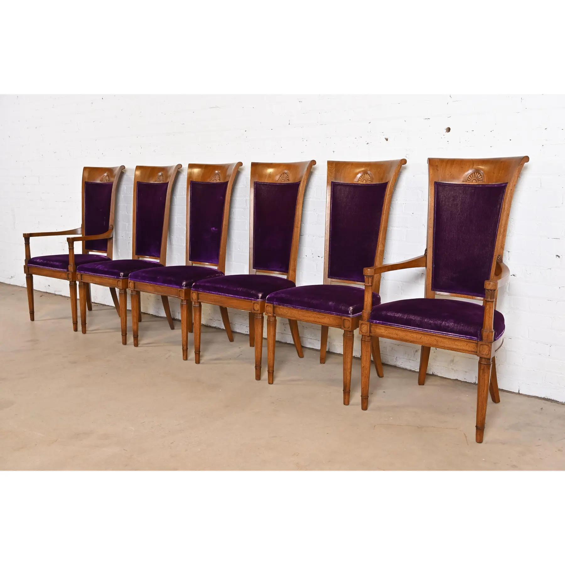 A gorgeous set of six French Regency Louis XVI style dining chairs

By John Stuart

USA, Circa 1960s

Gorgeous carved cherry wood frames, and purple velvet upholstered seats and backs.

Measures:
Side chairs: 19