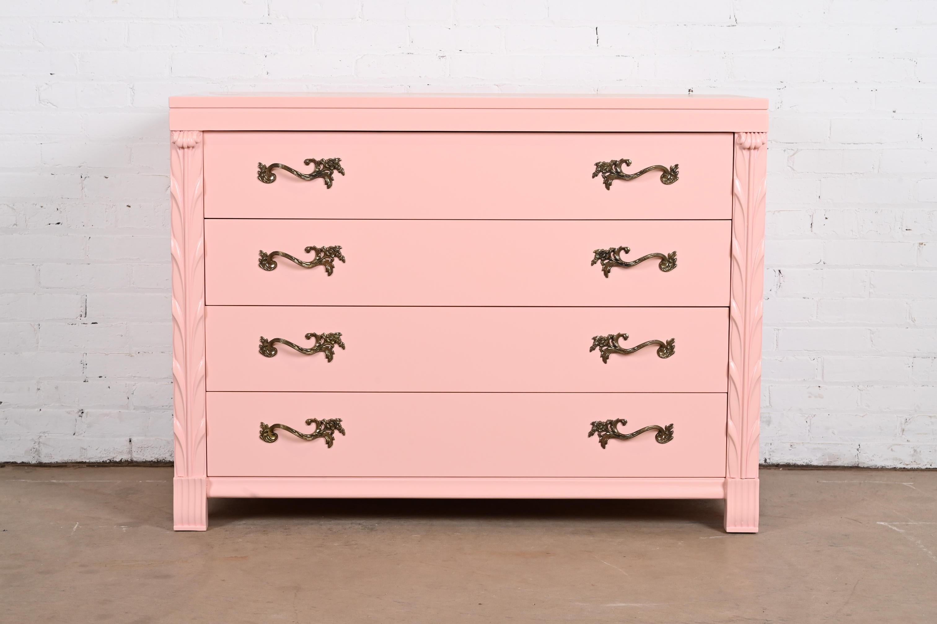 An outstanding French Regency Louis XV style dresser or chest of drawers

By John Stuart

USA, Circa 1940s

Pink lacquered mahogany, with original brass hardware.

Measures: 46