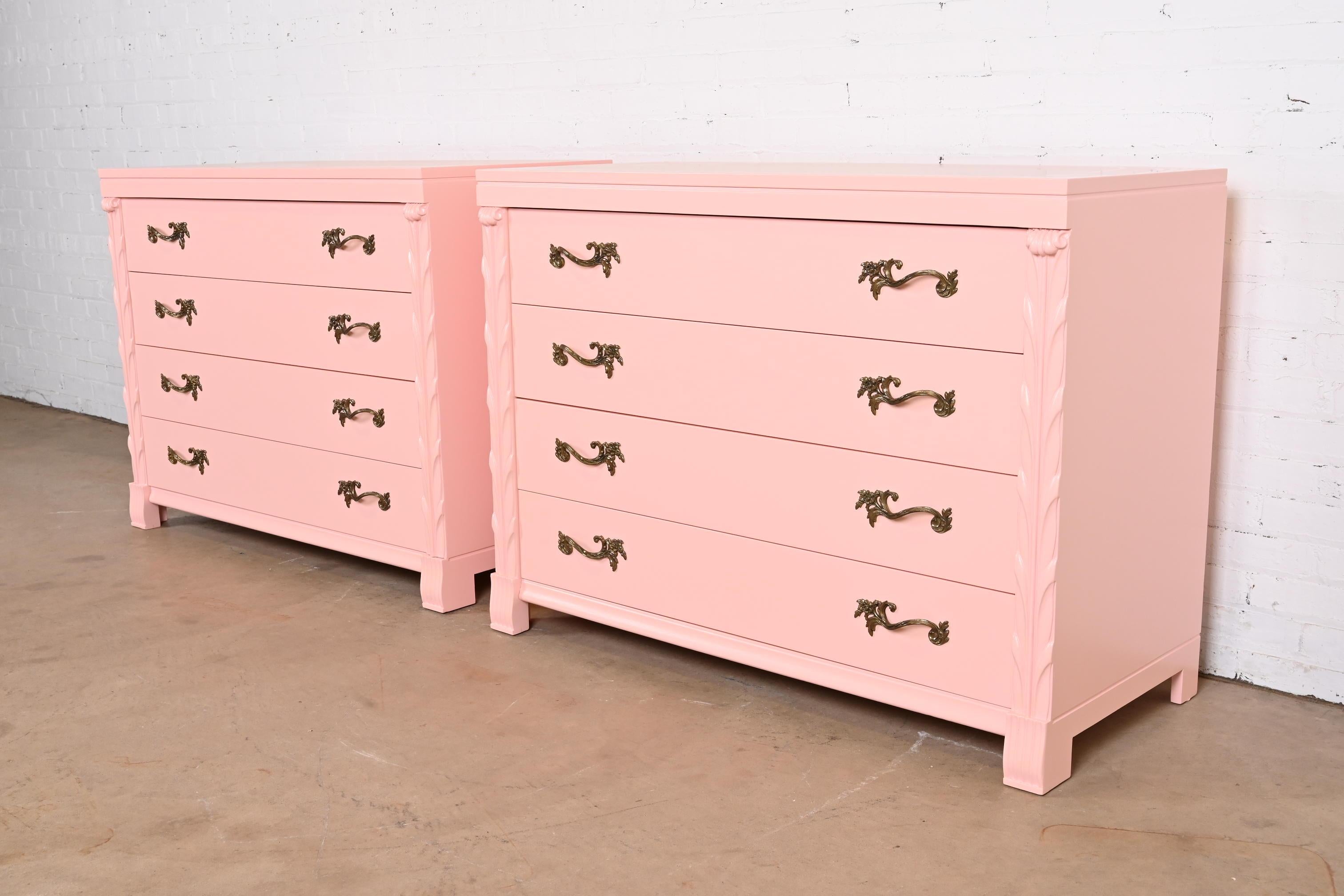 An outstanding pair of French Regency Louis XV style dressers or chests of drawers

By John Stuart

USA, Circa 1940s

Pink lacquered mahogany, with original brass hardware.

Measures: 46