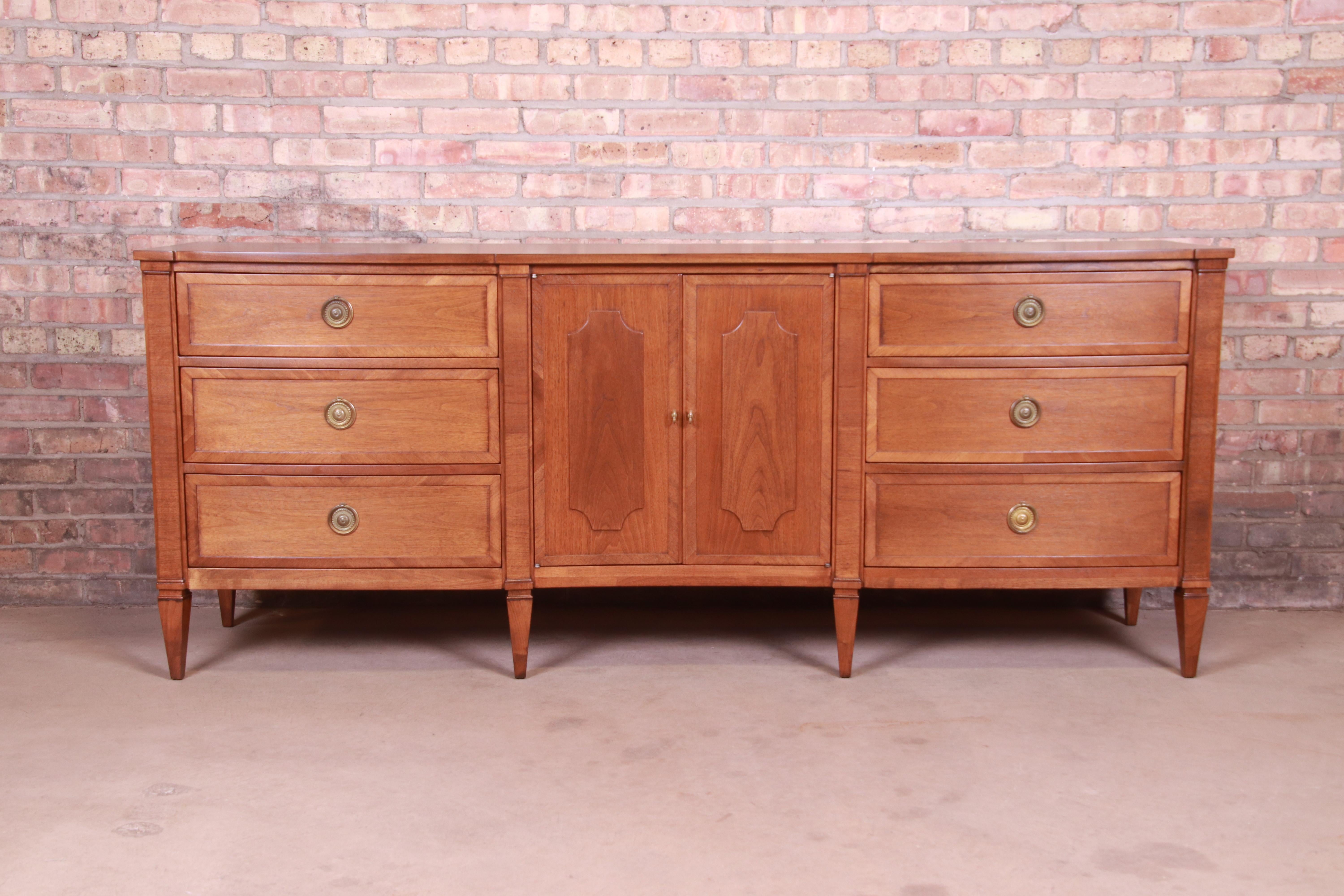 An exceptional mid-century French Regency style long dresser or credenza

By John Stuart for Mt. Airy 