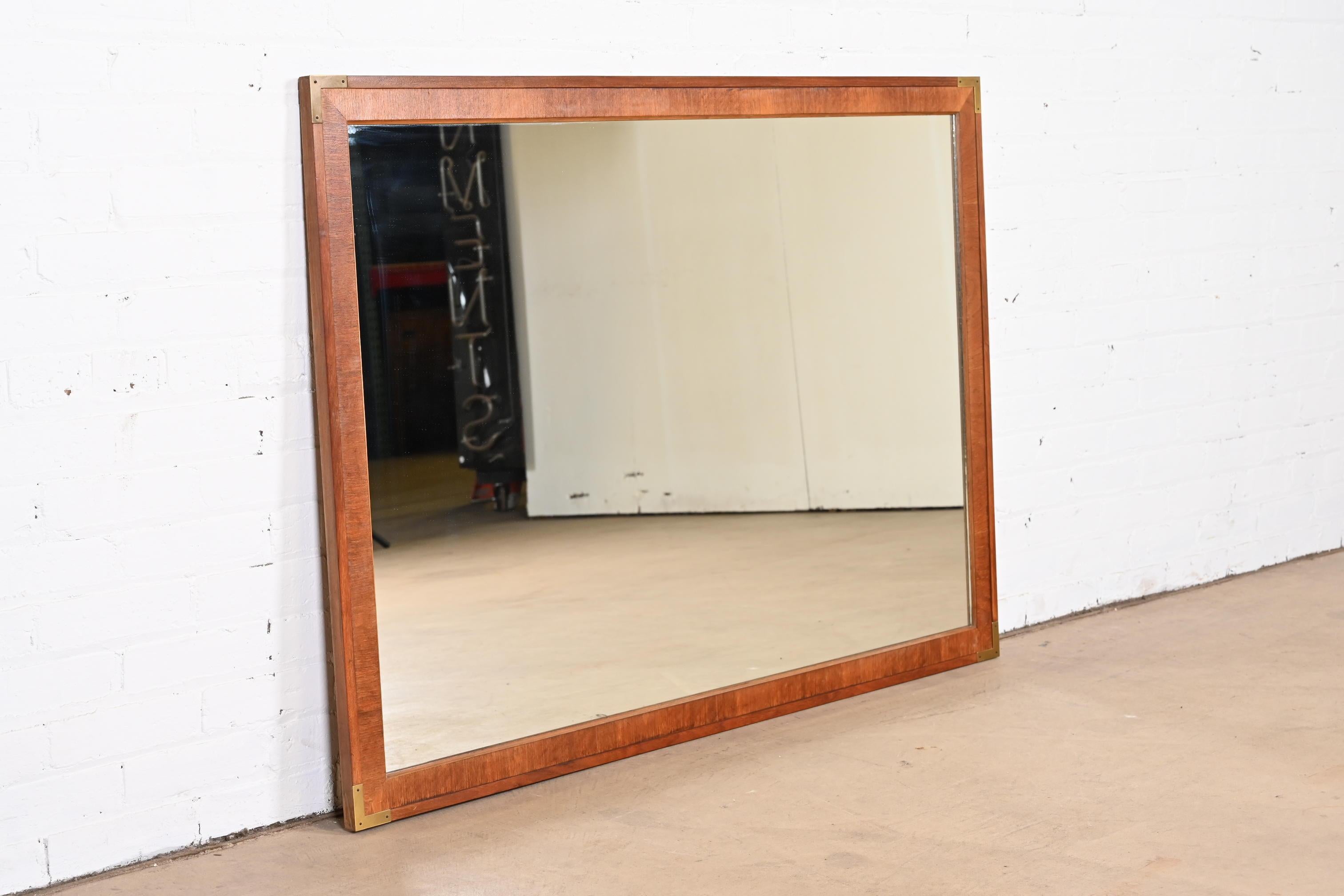 John Stuart Mid-Century Modern Campaign Walnut and Brass Wall Mirror In Good Condition For Sale In South Bend, IN