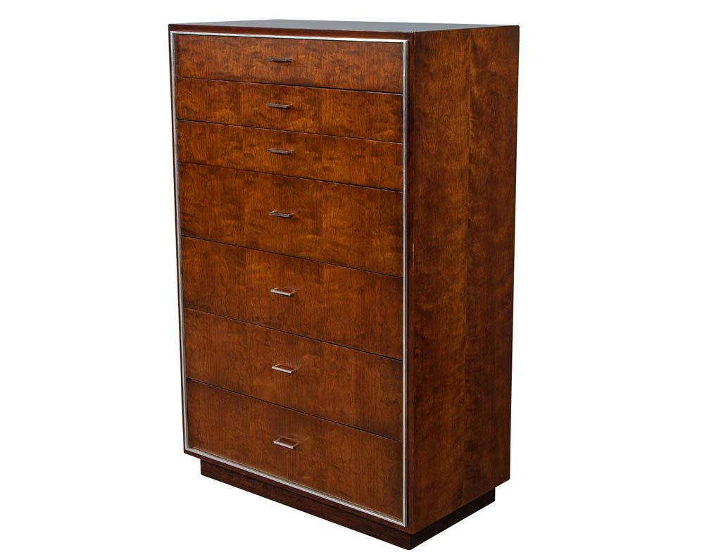 Mid-Century Modern chest of drawers by John Stuart. Composed of cherrywood with Fine detailed nickel inlay and hardware. This cabinet was manufactured, circa 1970s in the USA, Grand Rapids.