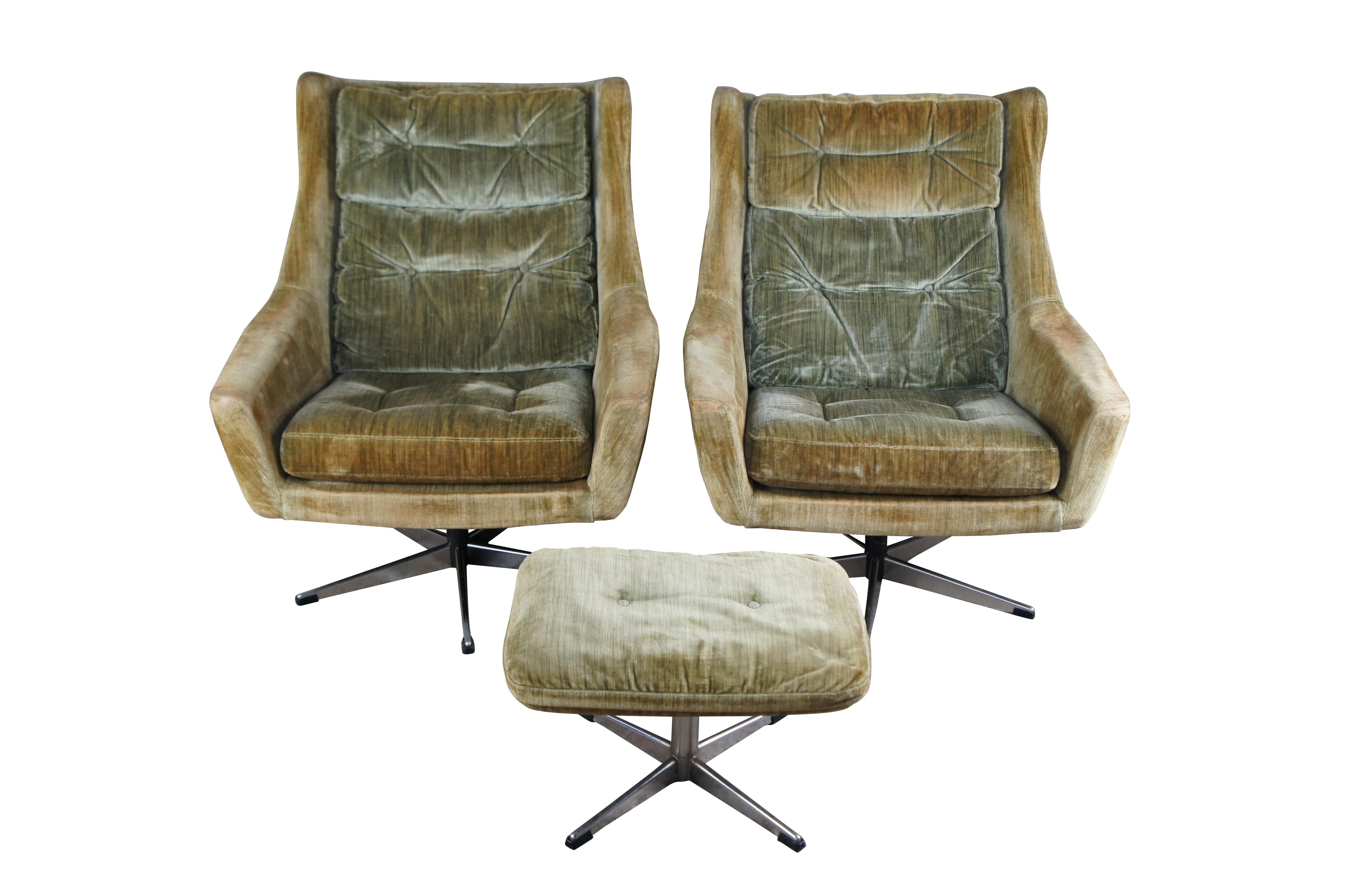 Very comfortable mid century modern John Stuart Eames style swivel wingback arm chairs and ottoman.

John Widdicomb Company:  Stuart joined the John Widdicomb Company of Grand Rapids in 1929 as sales manager and minority owner.  He became majority