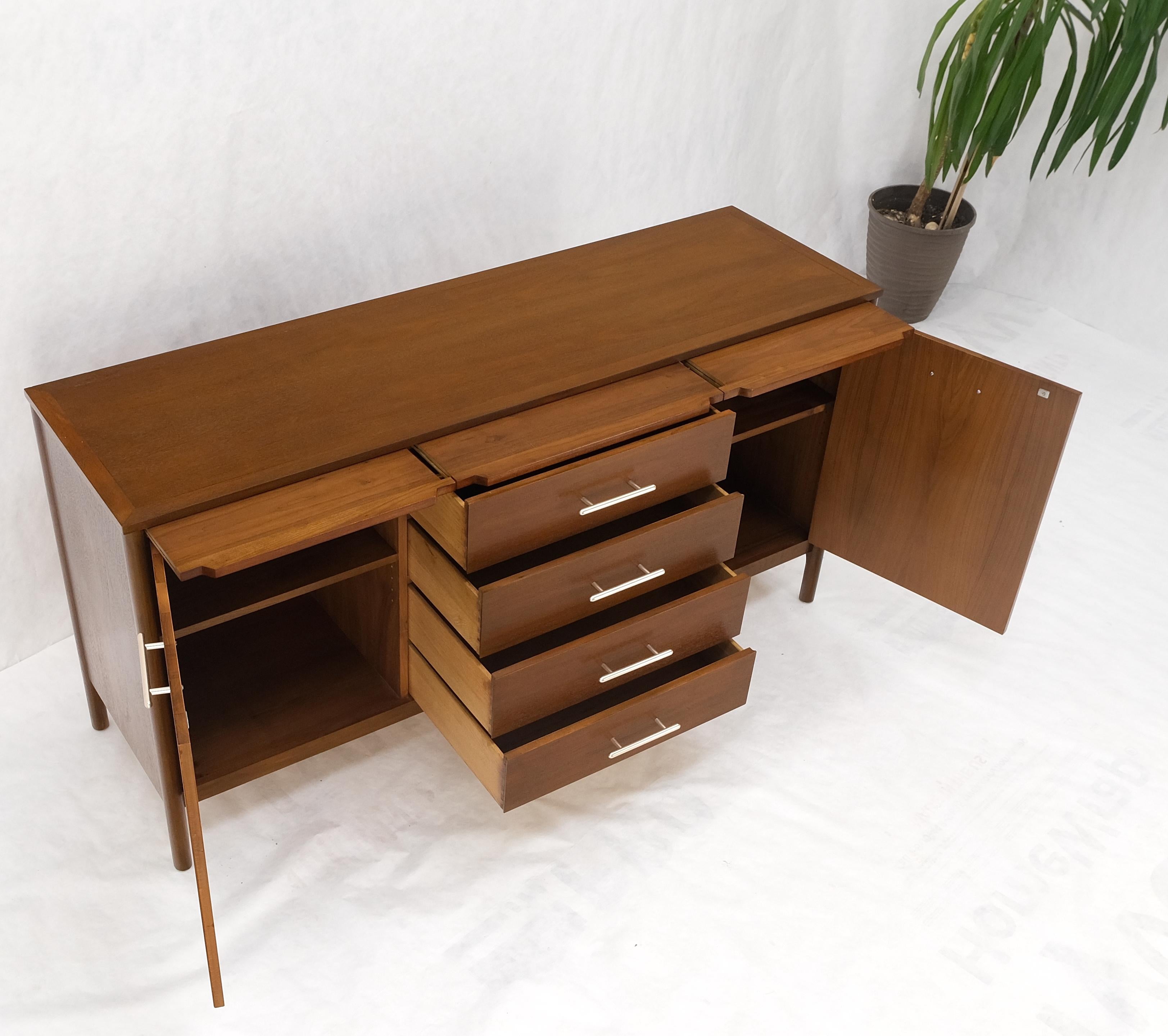 John Stuart walnut Mid-Century Modern long credenza dresser server sideboard w/ 3 pull out shelf tabs mint! 
Two door compartments 4 drawers, brushed pewter hardware.