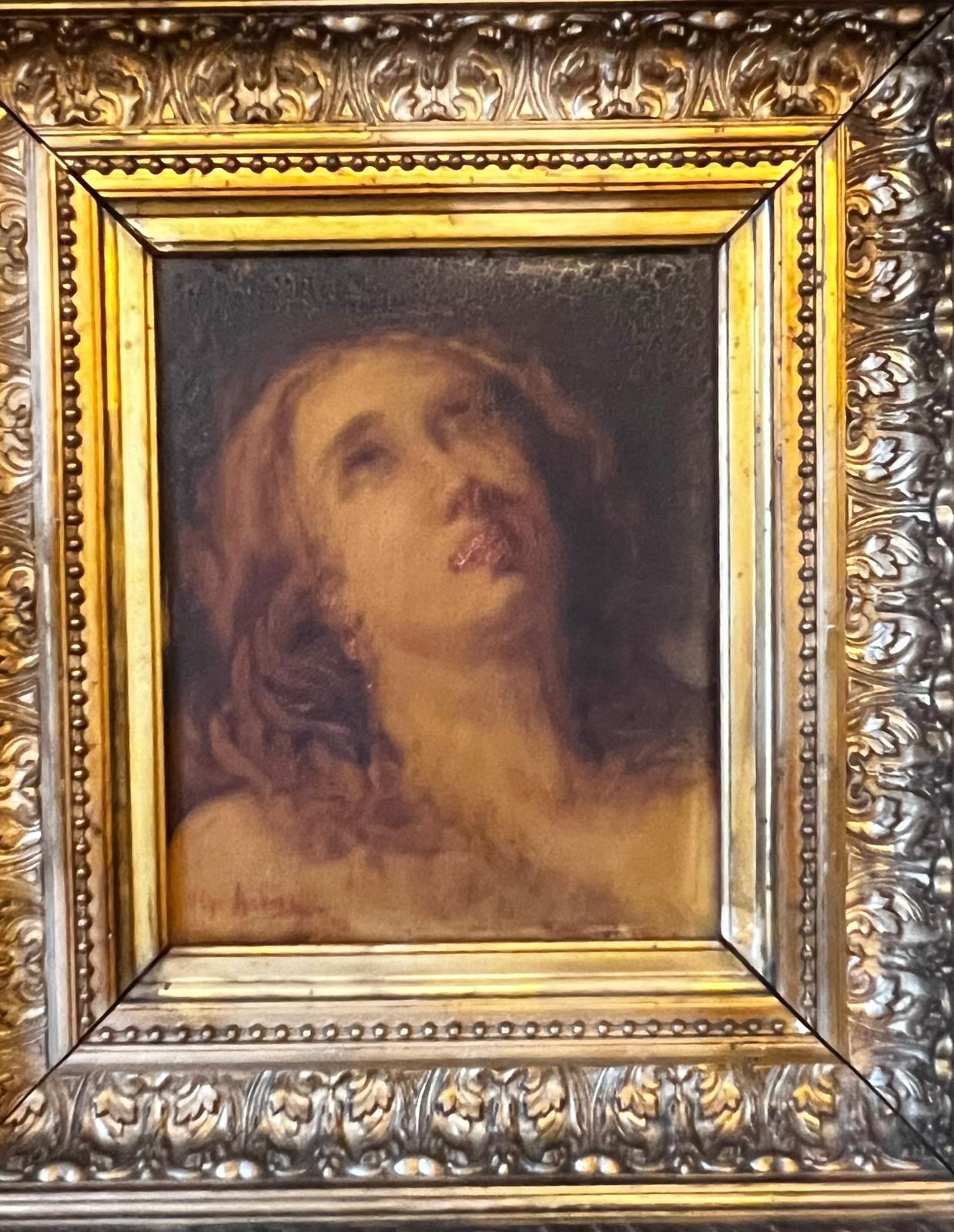 The beautiful and intriguing 19th century portrait of John the Baptist, oil on wood, in style of Francisco Goya, signed lower left by French painter Saint Cyr Anduze. 
The painting is framed in a gold gilded stunning frame.  