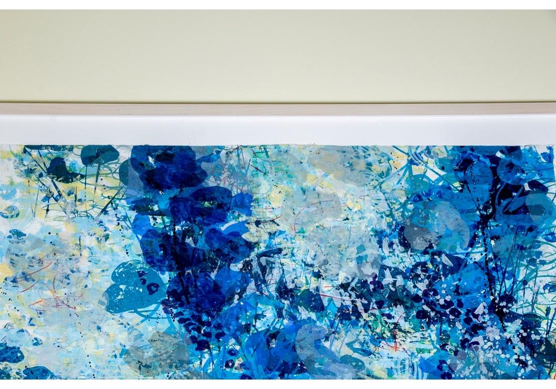 A contemporary abstract composition of botanical and floral elements in varied tones of blue. Titled 