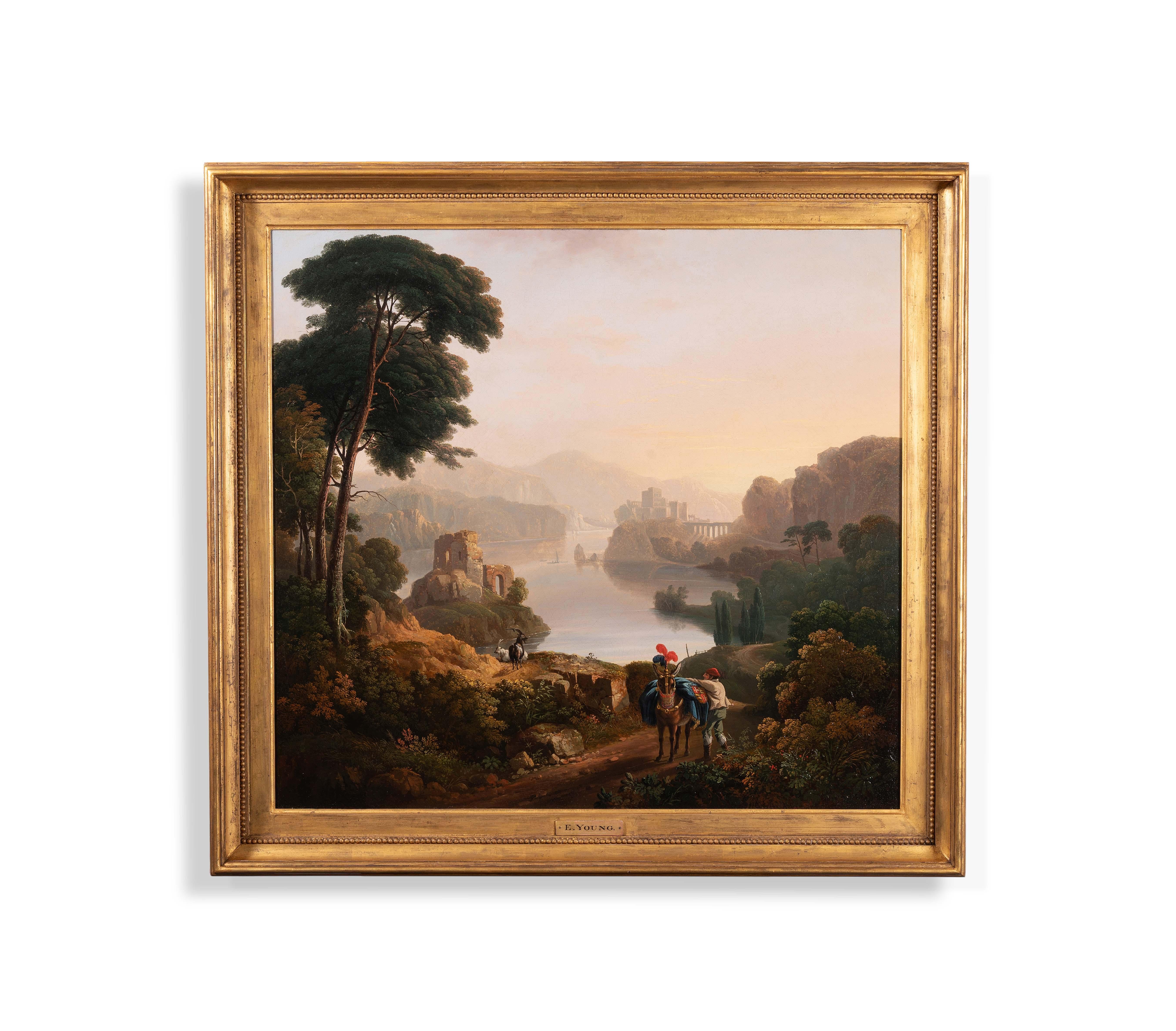 An Italianate landscape with a messenger & his horse on a wooded path, a lake