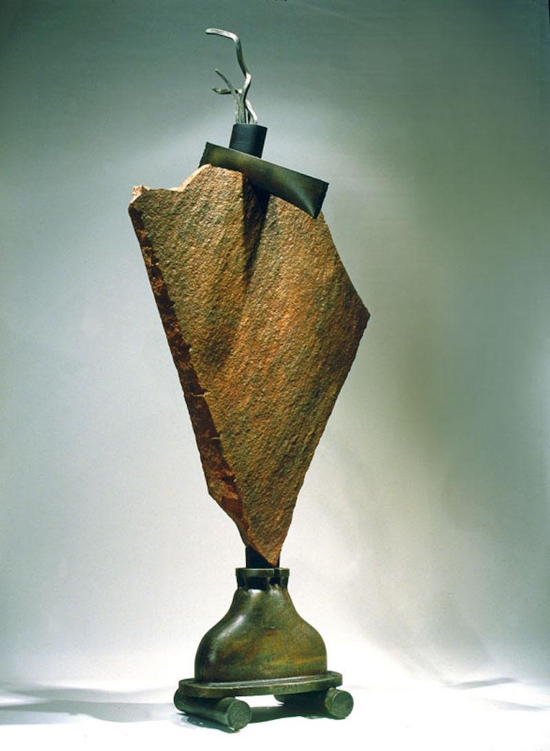 ON THE EDGE I (ARTIST
S PASSAGE)
Polychromed granite and steel
98" (height) x 41" (width) x 30" (depth)

Stone and metal, usually granite or slate, and found object steel are central in my sculpture. The interaction of these materials is a major