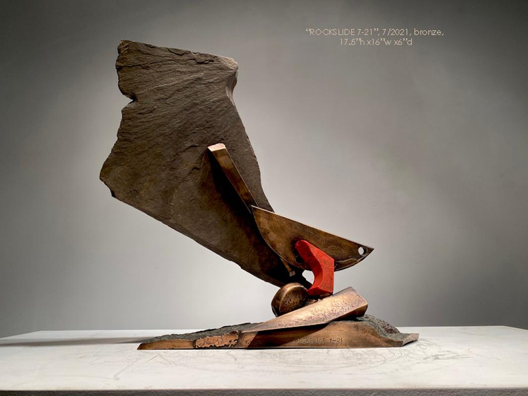 Rockslide 7-21
NY State skate and bronze
17.5" (height) x 16" (width) x 6" (depth)

Stone and metal, usually granite or slate, and found object steel are central in my sculpture. The interaction of these materials is a major focus. On the most basic