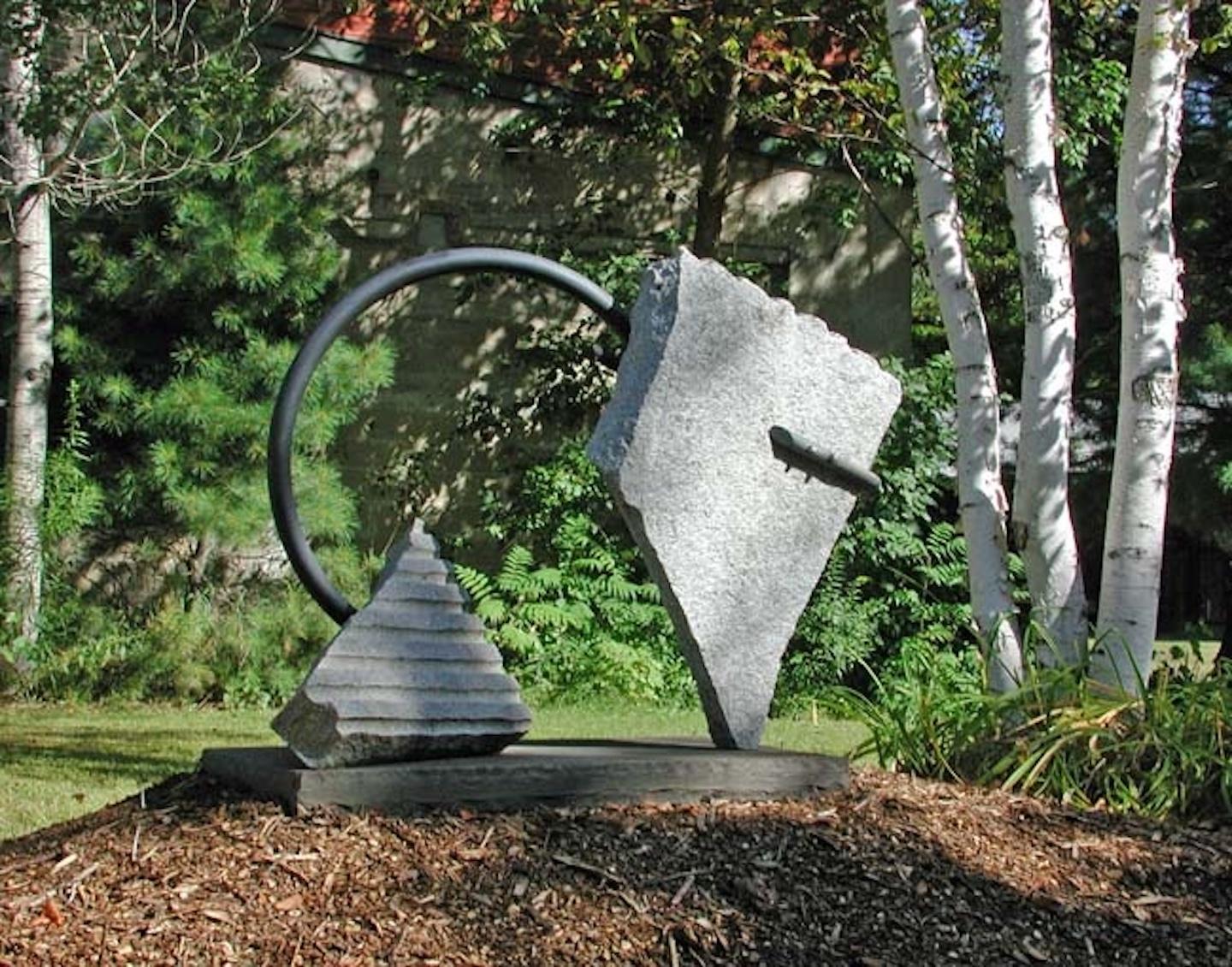 Stone and metal,usually granite or slate and found object steel are central in my sculpture. The interaction of these materials is a major focus. On the most basic level the work is about the marriage of the natural with the human-made. Stone is